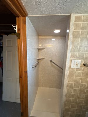 Acrylic Walk-In Shower Installation with Marble Patterns in Williamsburg