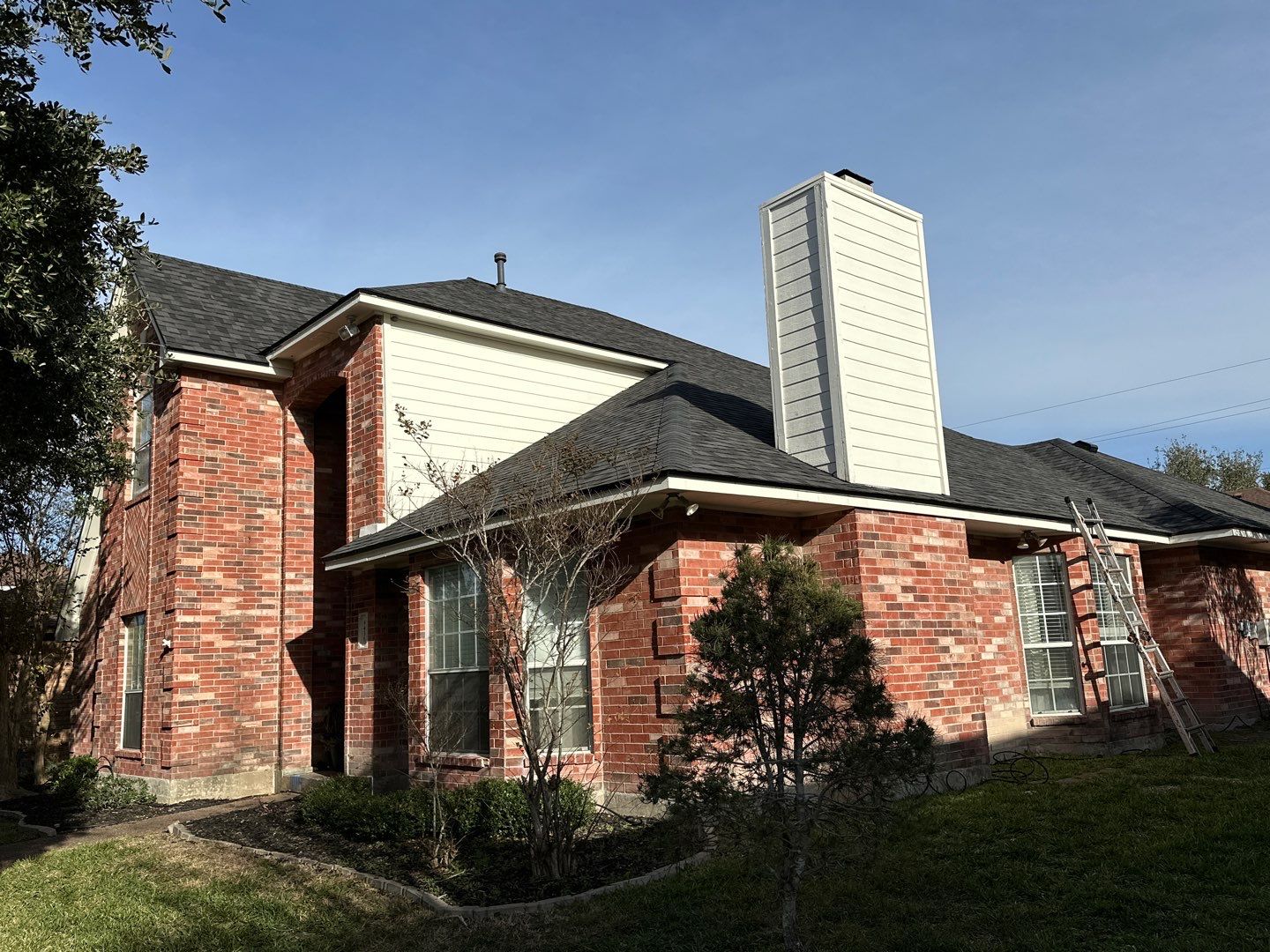 Residential Roofing Installation using Certainteed Landmark Moire Black by Galvan Roofing and Construction
