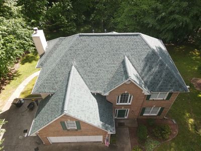Residential Roofing Installation using Owens Corning Chateau Green