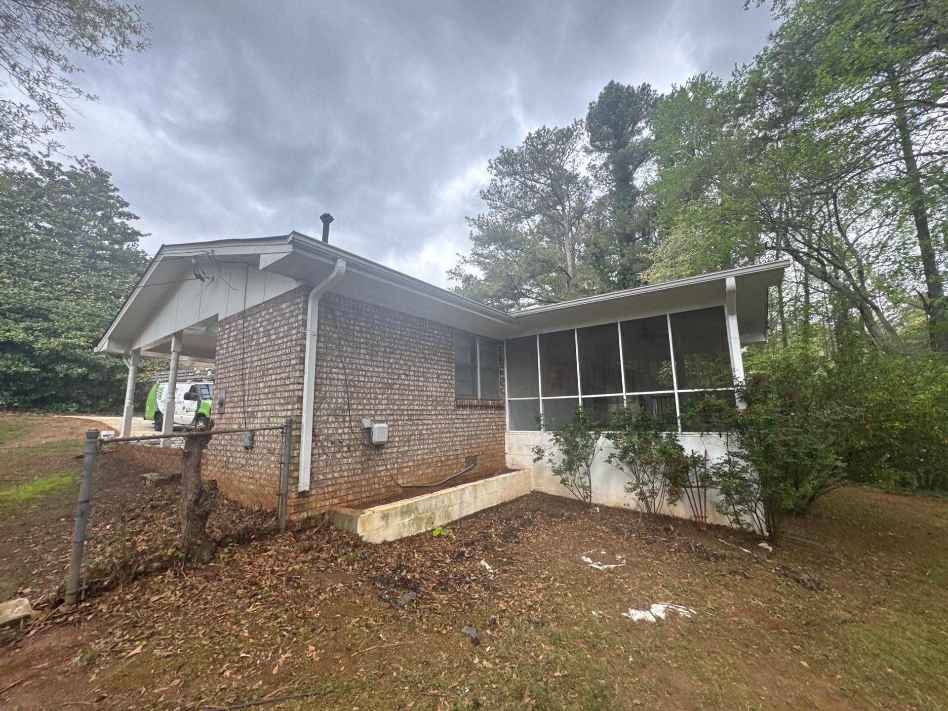 White Brick Exterior Painting and Shutter Refresh in Marietta by Swift Home Renovations