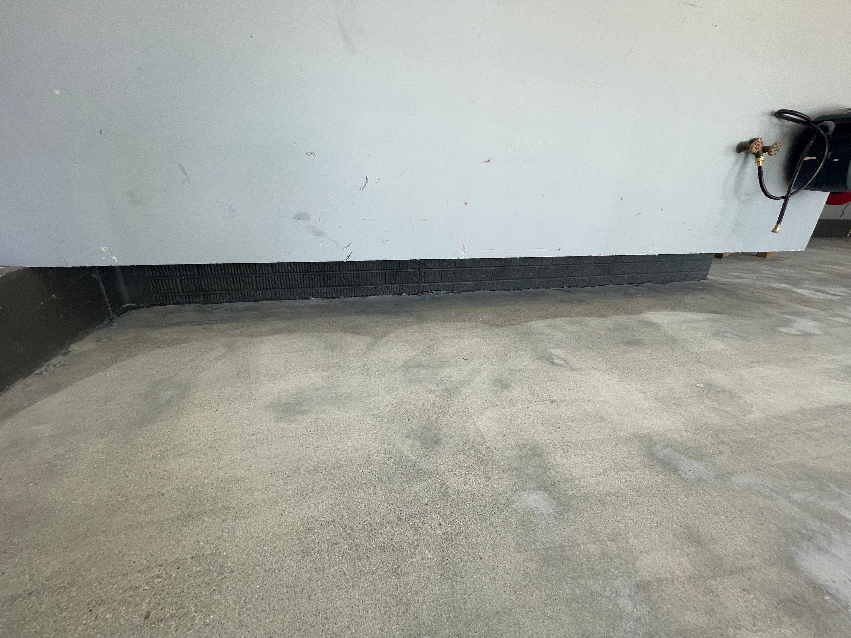 Residential Garage Floor Coating in Sioux Falls by Select Painting, Coatings & Garage Cabinets