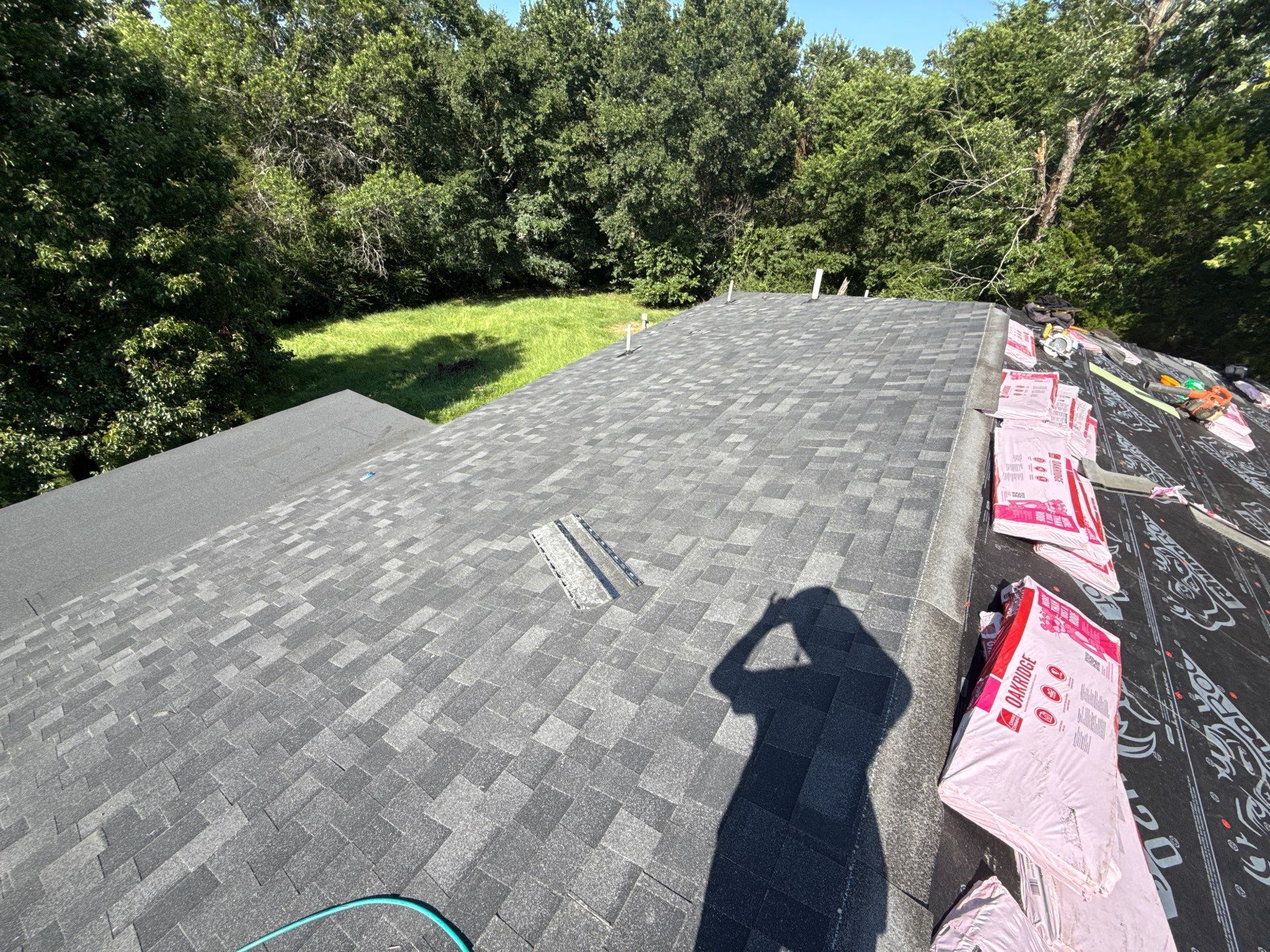 2 layers tear off & installation of new architectural shingles. by In & Out Construction & Remodeling, LLC