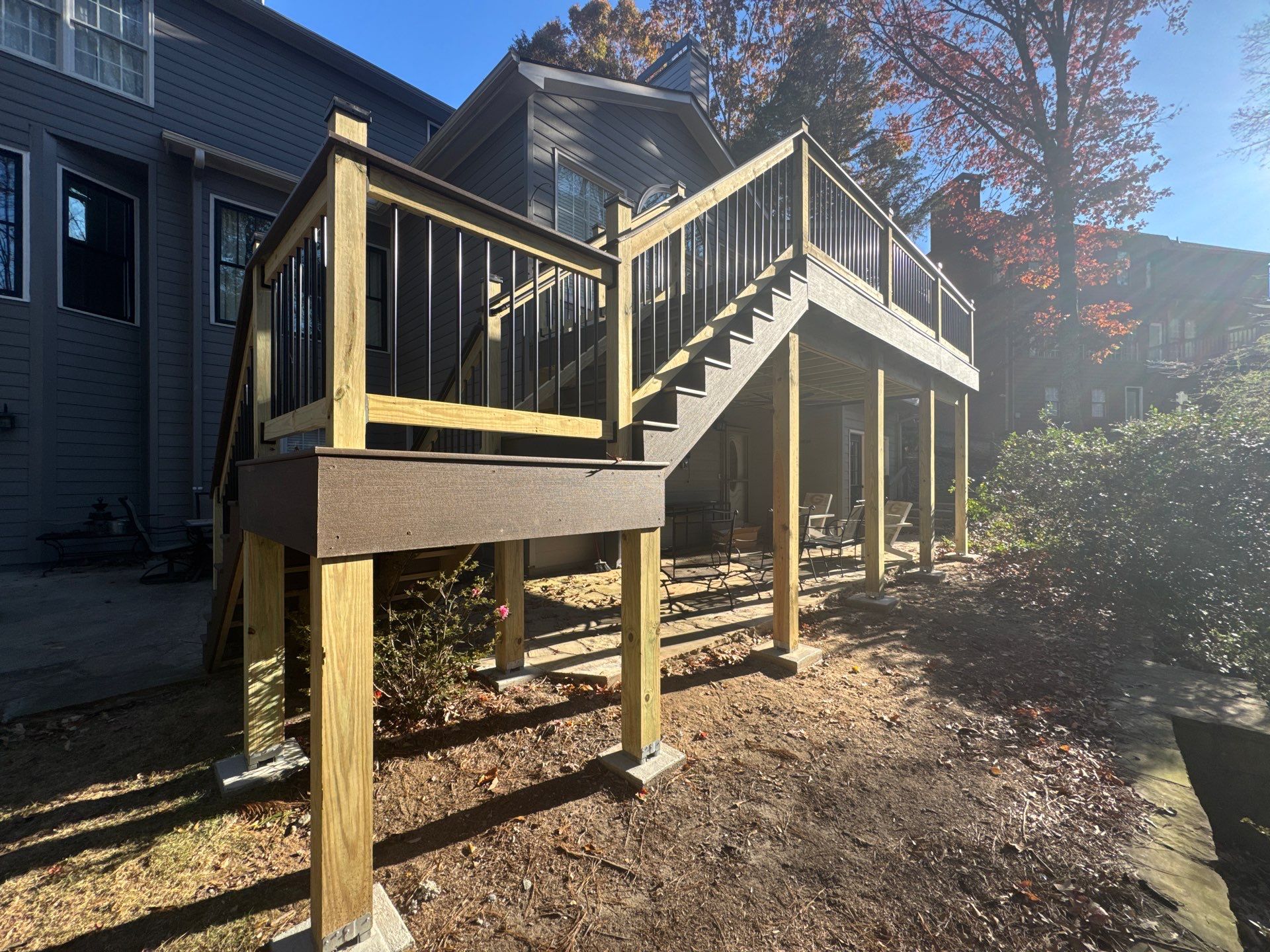 Custom Multi-Level Composite Deck and Sunroom Addition in Suwanee by Swift Home Renovations 