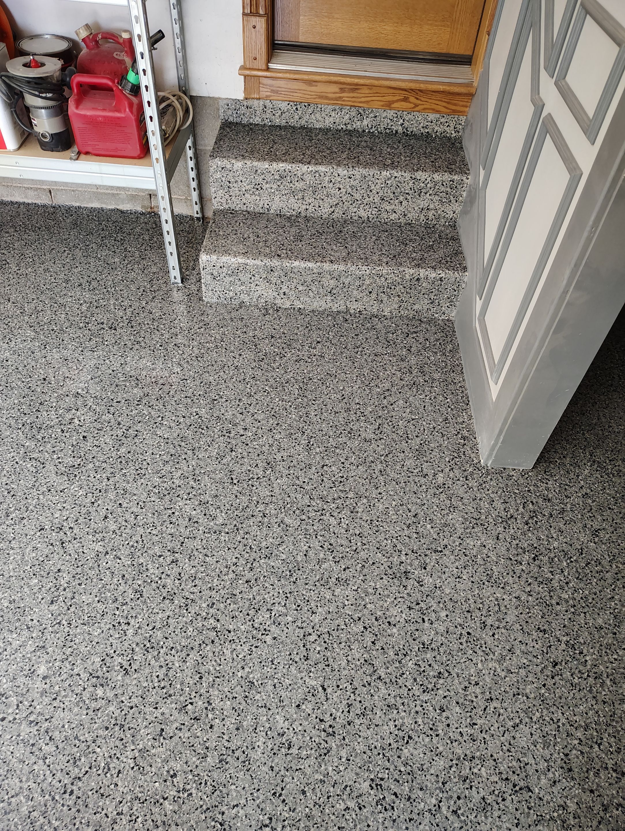 Nightfall Decorative Chip Garage Floor Coating in Luverne, Minnesota by Select Painting, Coatings & Garage Cabinets