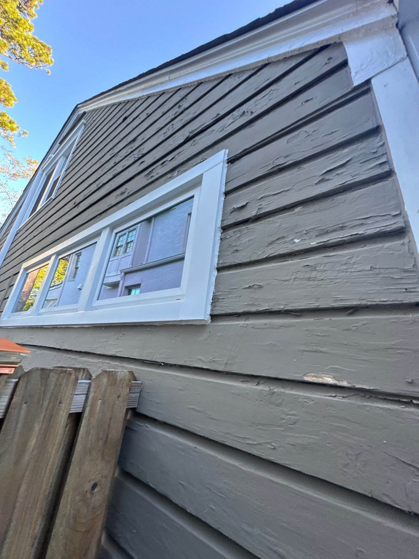 Full Siding Replacement, Deck Build, Exterior Paint, and Gutter Replacement  by Nelson Exteriors 