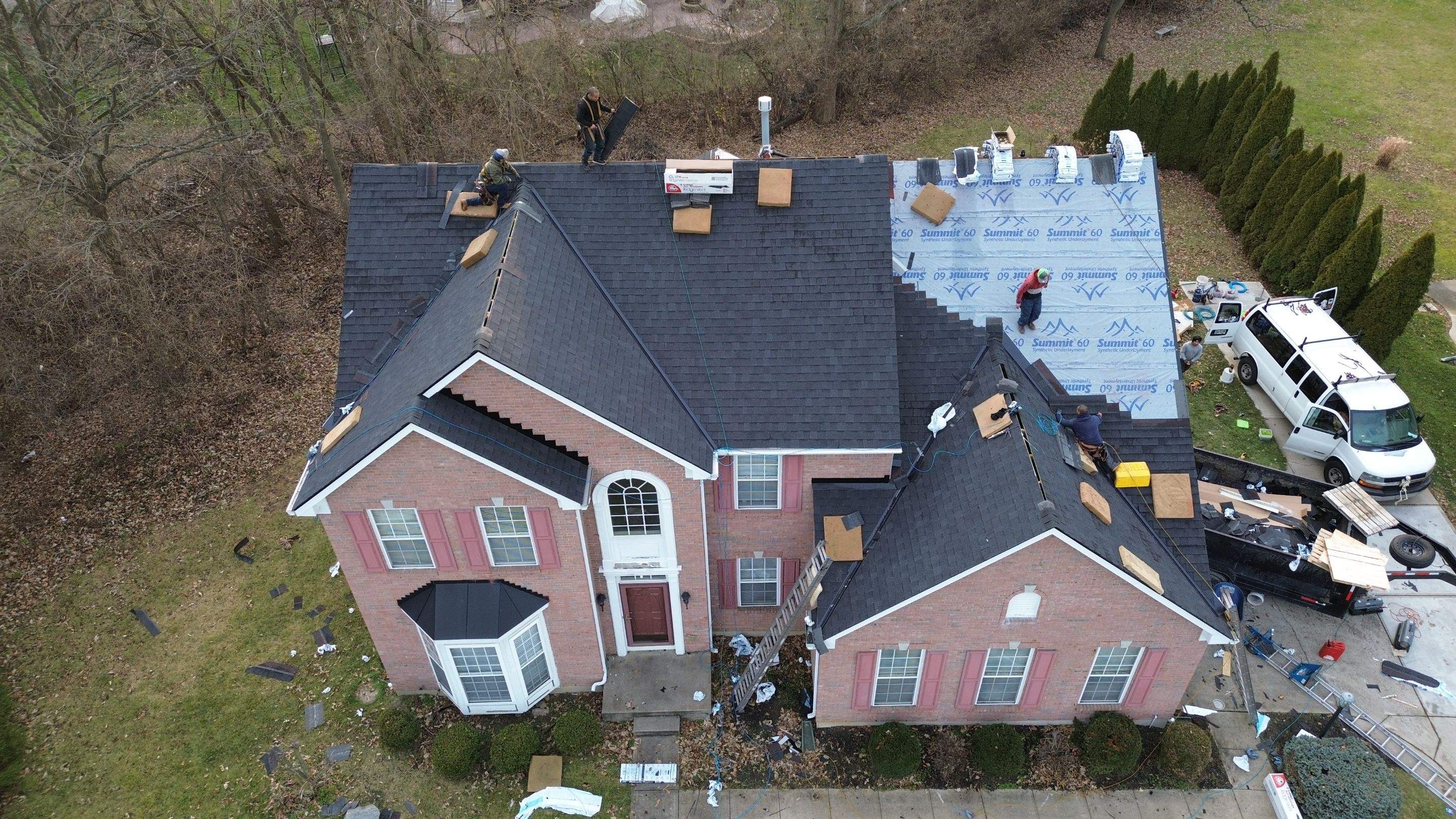 Walden Ponds - Pristine Black and Hydro Flo Gutter Guards by Tamlin Roofing