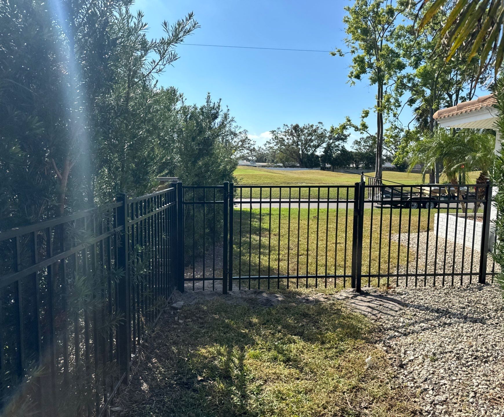 Aluminum Fence Installation using 3 Rail 4Ft Black Aluminum and 4Ft White Vinyl Fence by Asap fence and gates, LLC