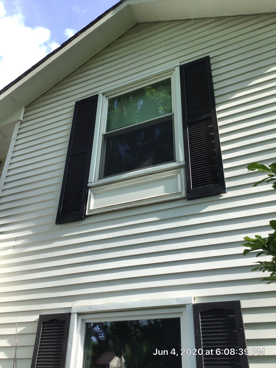 James Hardie Siding  using James Hardie Board and Batten, White by Absolute Roofing and Construction