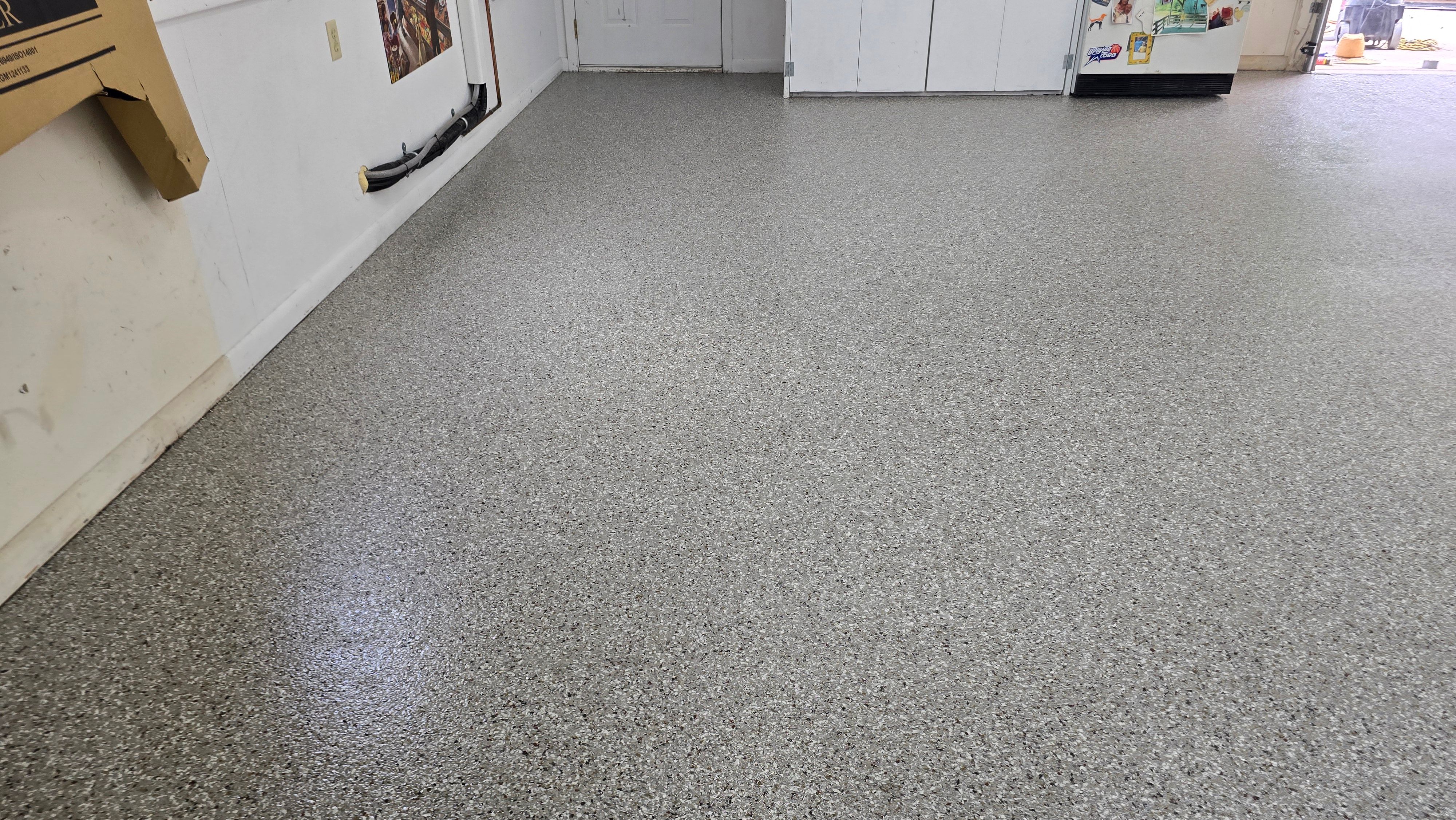 Driveway, Garage, Porch, and Sidewalk using Creekbed by Elite Floor Solutions