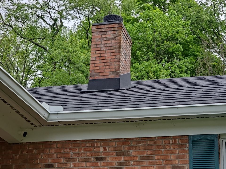 Residential Roofing Repair using Chimney counter flashing by Nitro Roofing and Construction