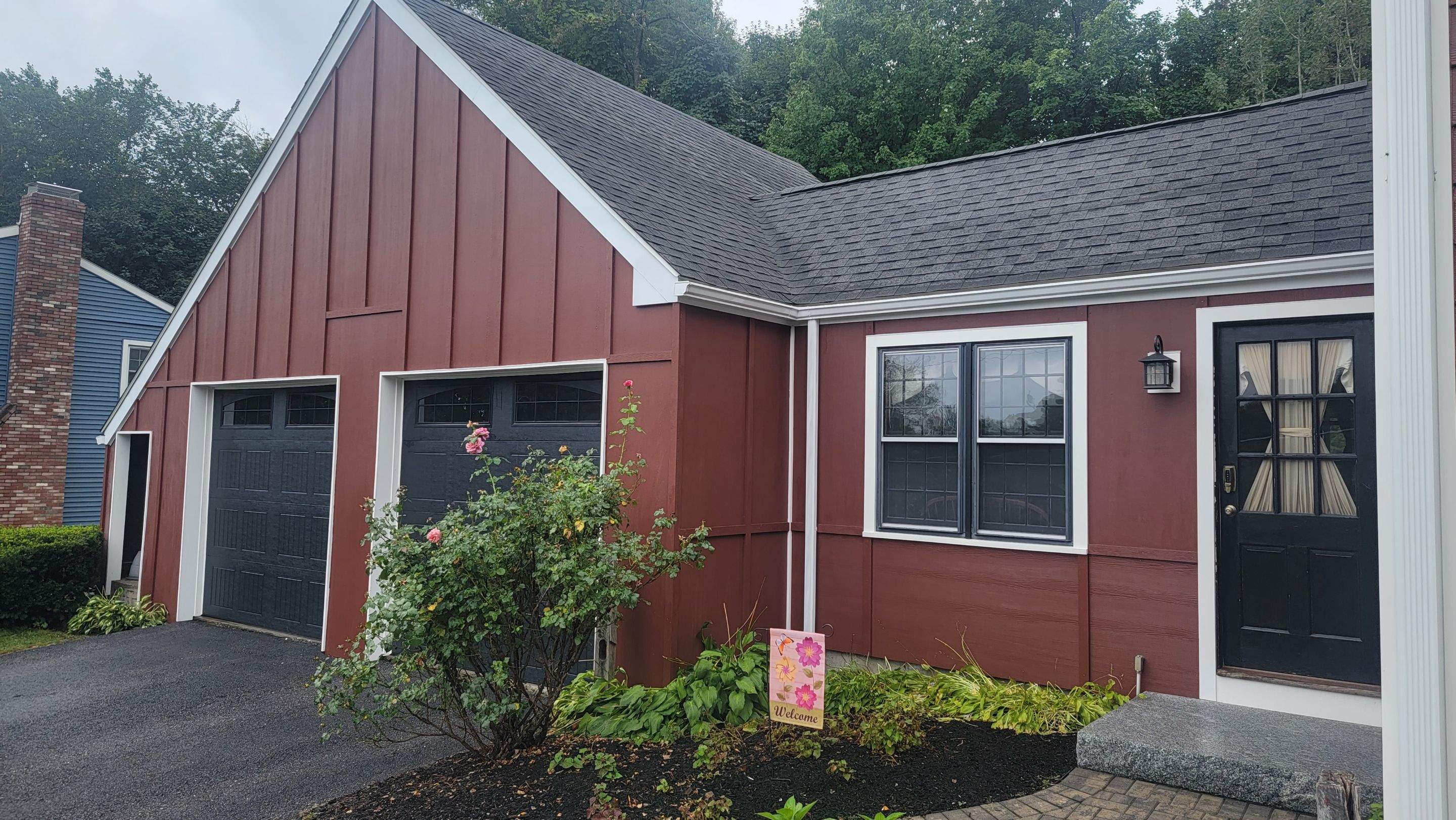Siding Installation using James Hardie Countrylane red by UBrothers Construction