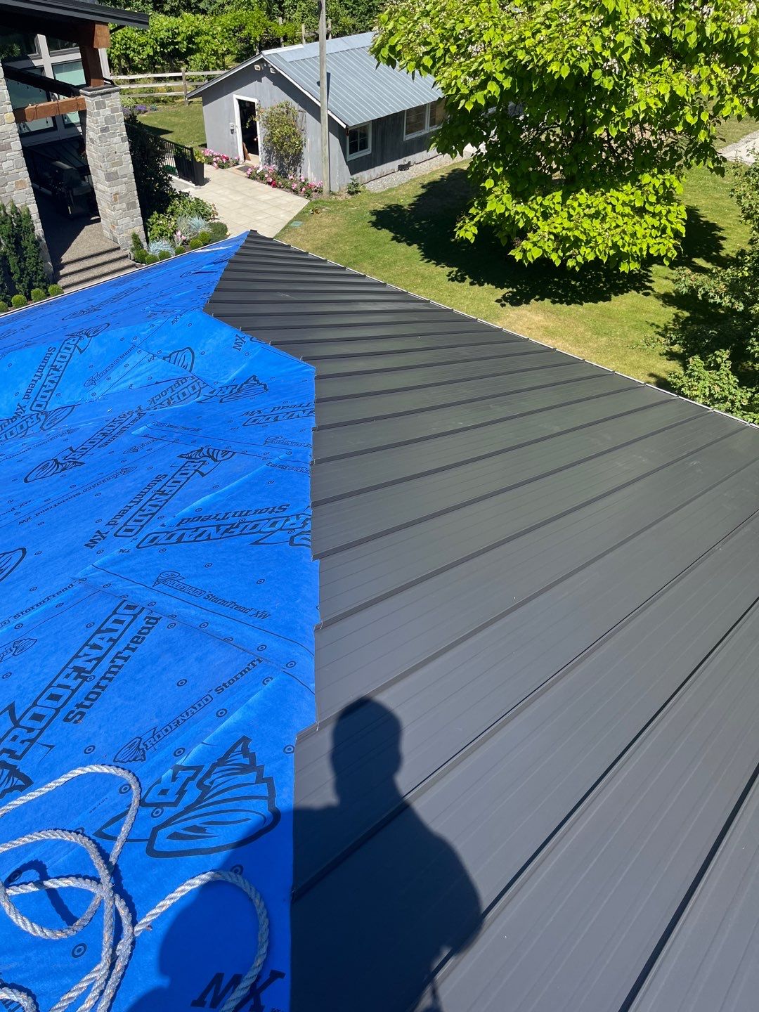 Residential Roofing Installation using 12" Prolok metal  by Top Notch Roofing Inc