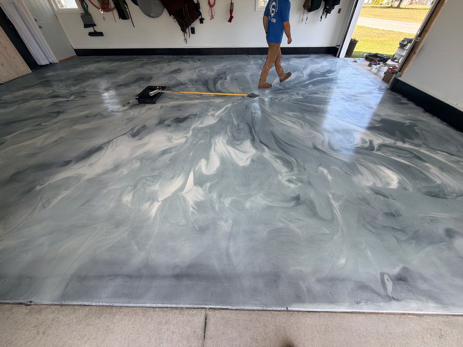 Custom Metallic Epoxy Floor and Polished Countertop Installation in Mears by Gordon Painting