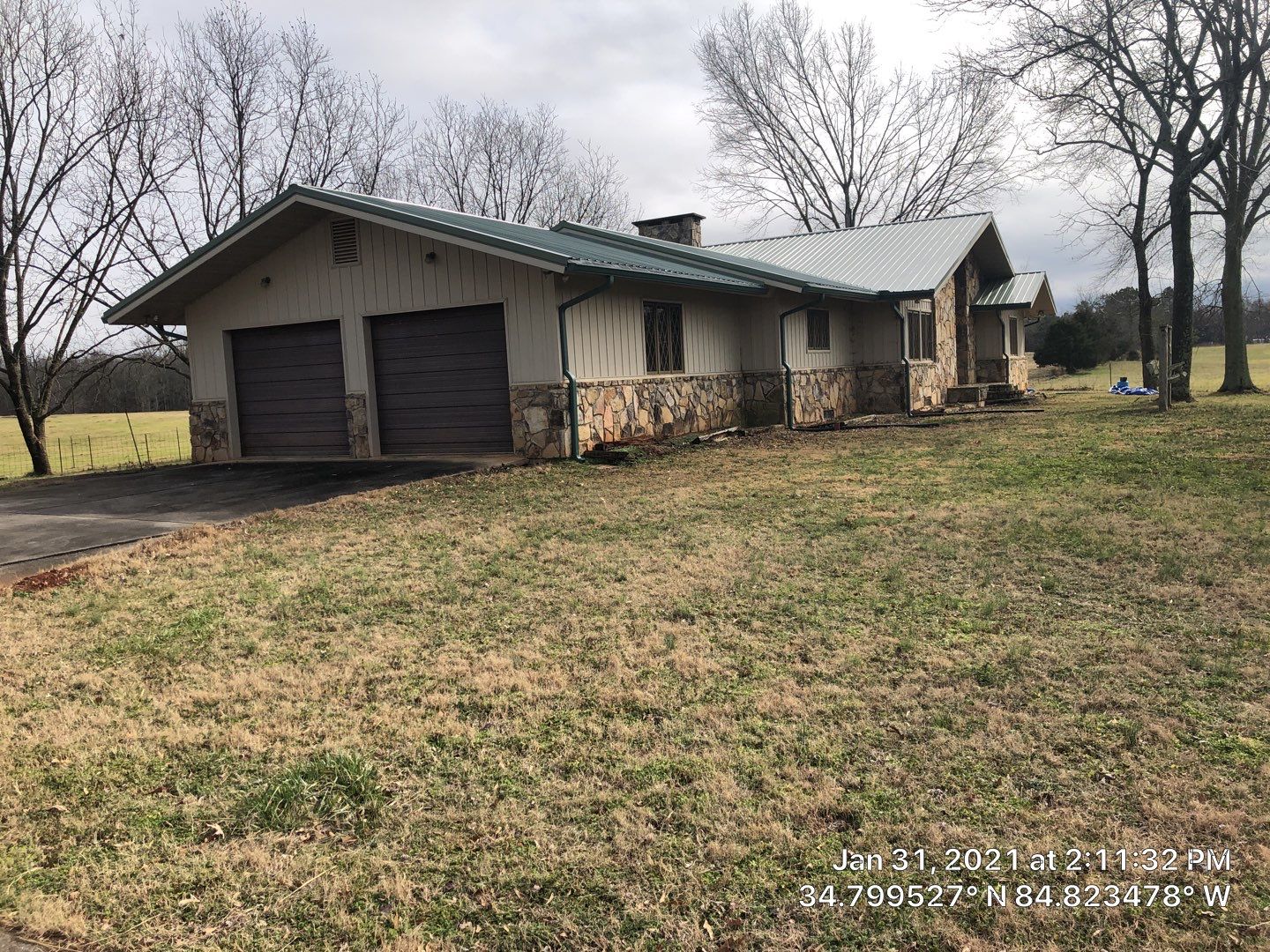 Green Metal Roof by Aultman Roofing