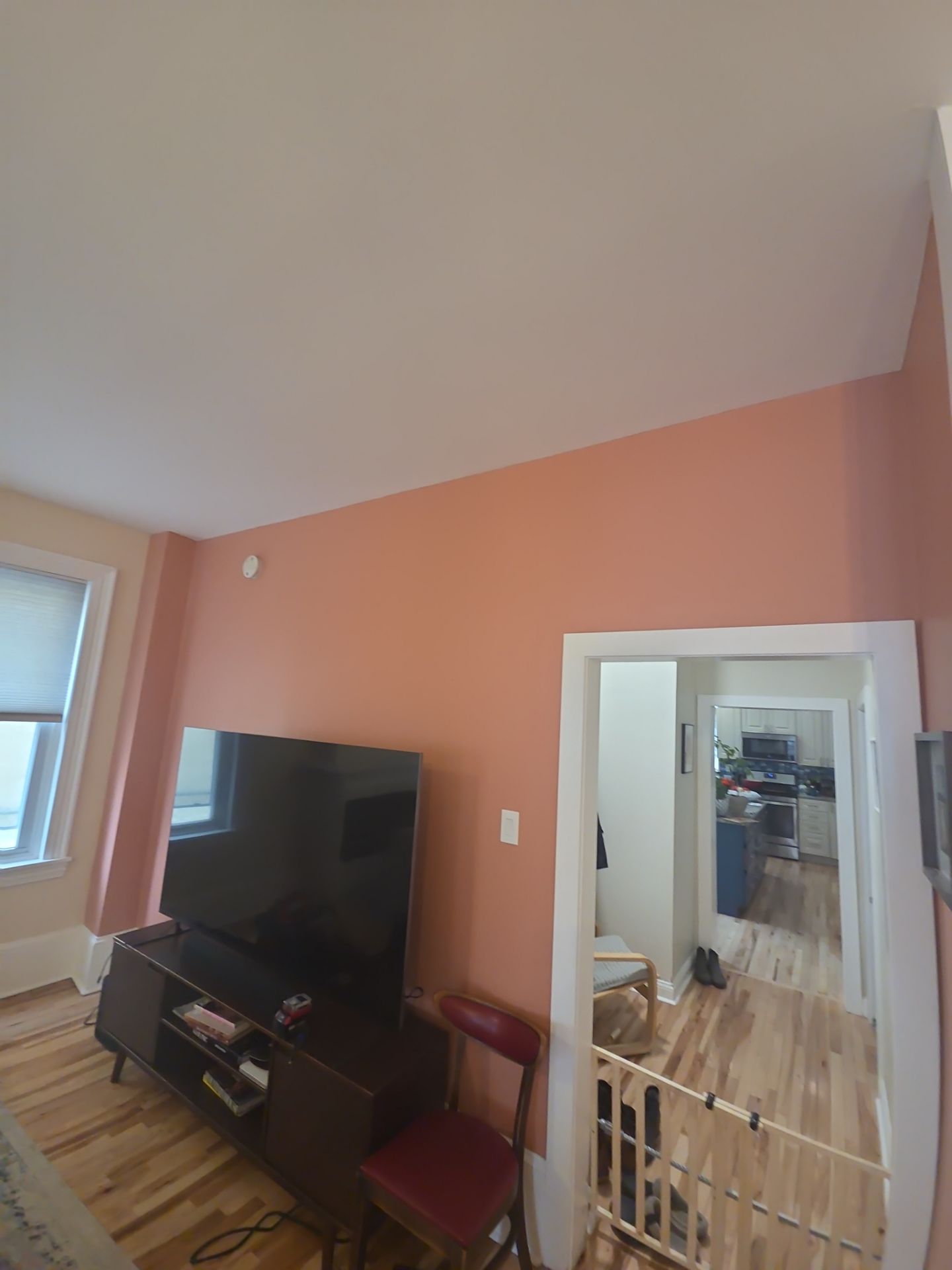 A Warm Neutral Living Room with a Bold Accent Feature by Groovy Hues