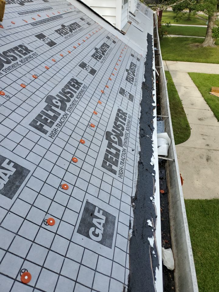 Residential Roofing Installation using Roof Replacement by American Roofing & Construction LLC