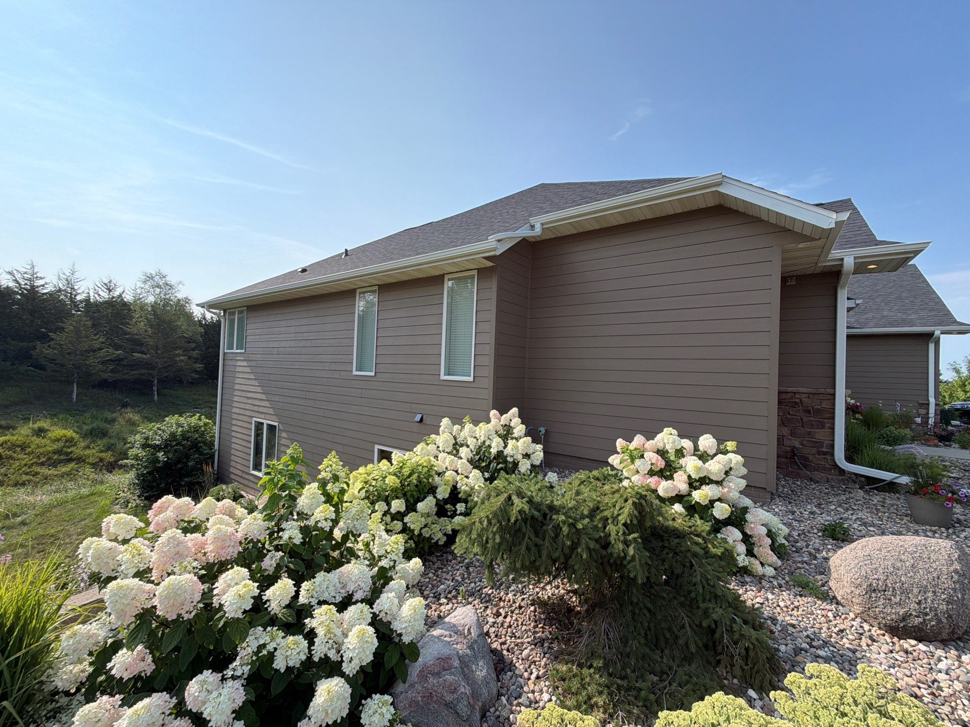 Sioux Falls Residential Exterior Painting and Siding Refresh by Select Painting, Coatings & Garage Cabinets