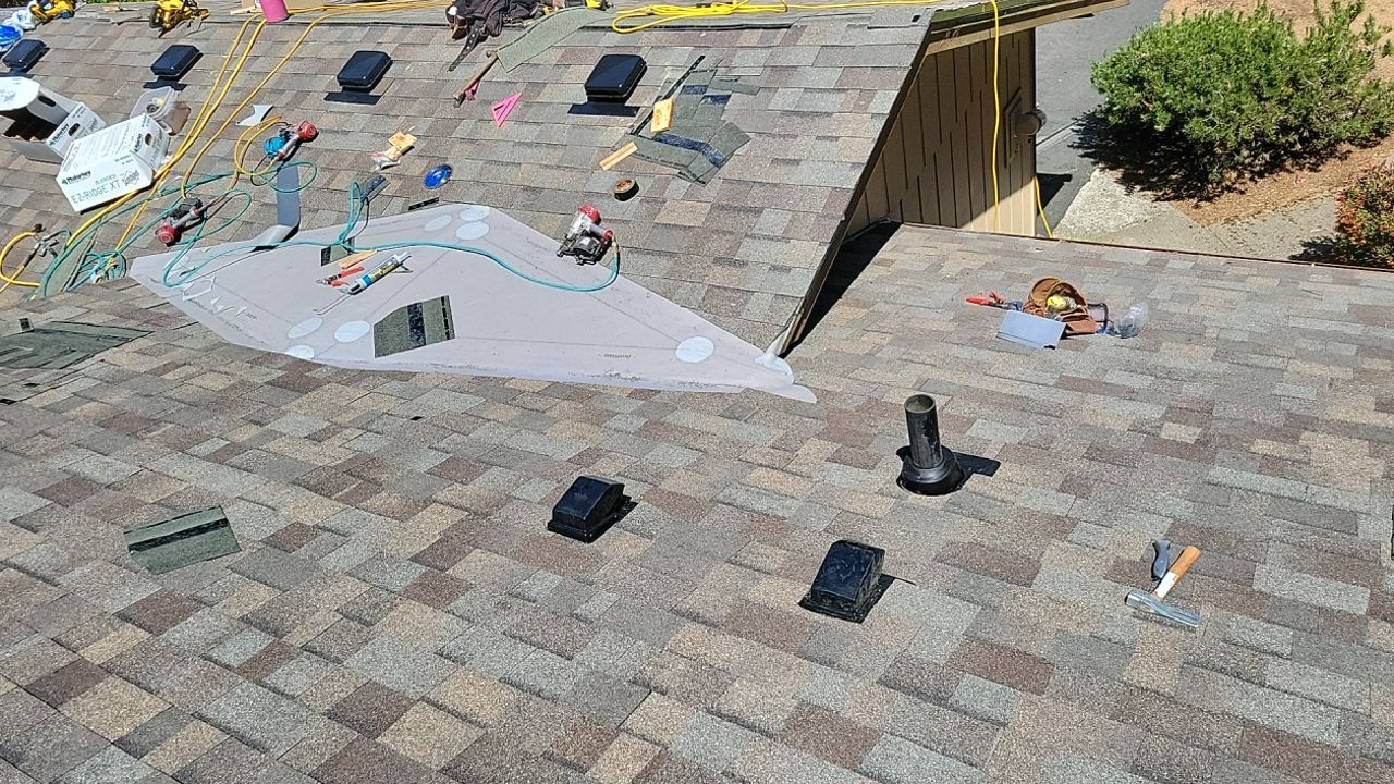 Residential Roofing Installation using Malarkey Highlander with GAF 60mil TPO by Orezona Building & Roofing Company, Inc.