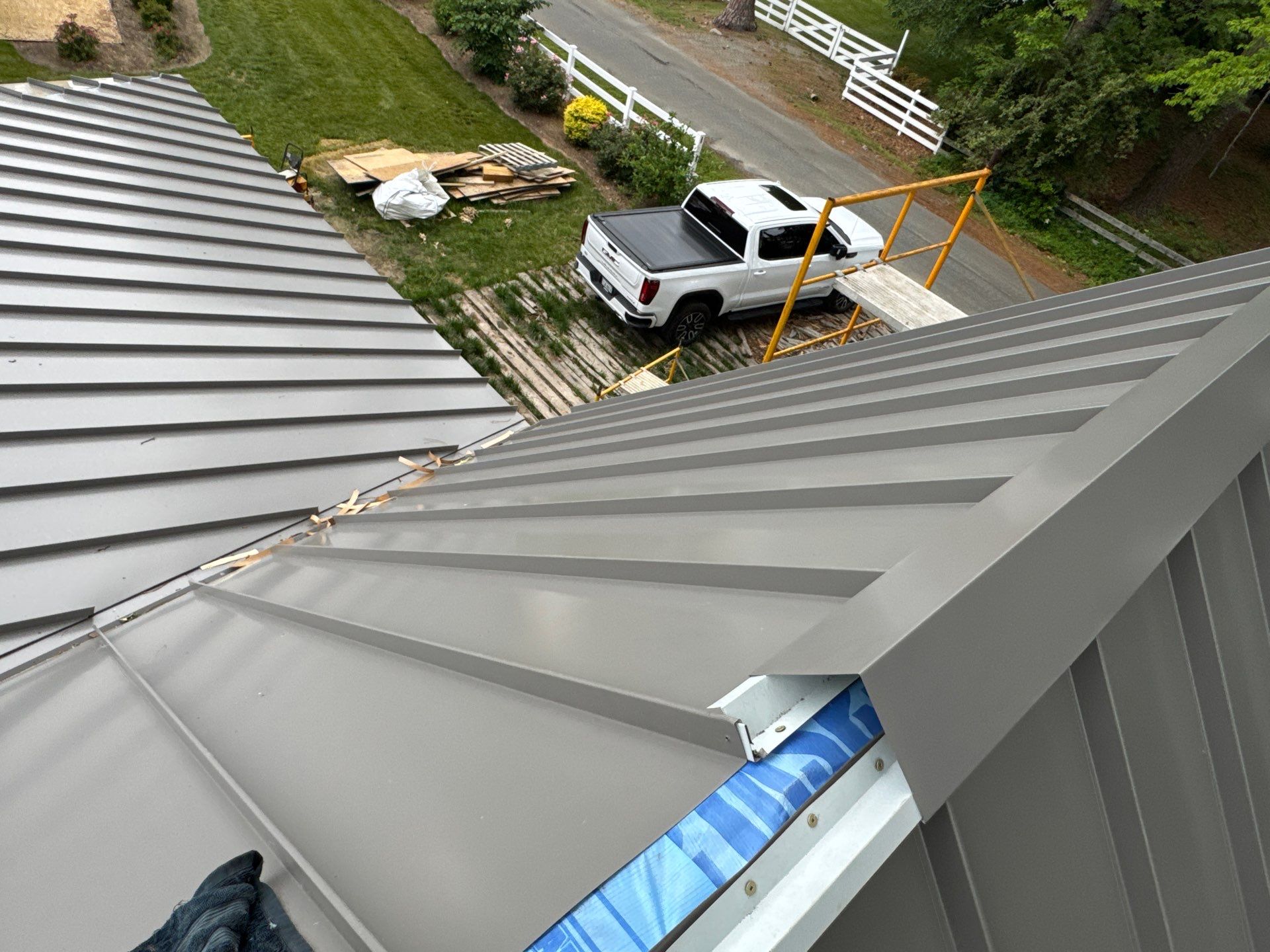 Custom New Construction Metal Roof Installation in Deltaville by Cade Construction