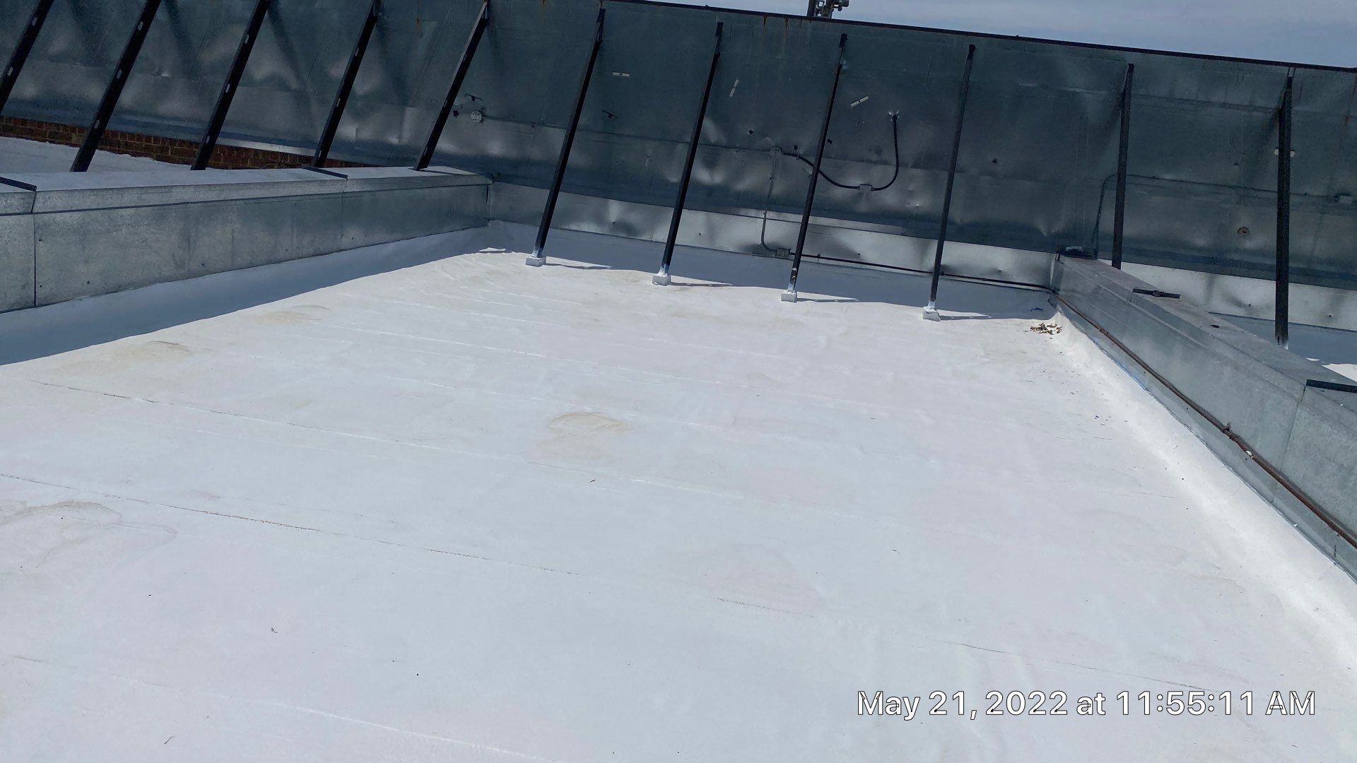 Commercial Roof Coating using Fiberseal basecoat and Silicon Topcoat by Just In Time Roofing and Restoration