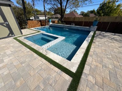Geometric Pool and Spa with Designer Tile Wall