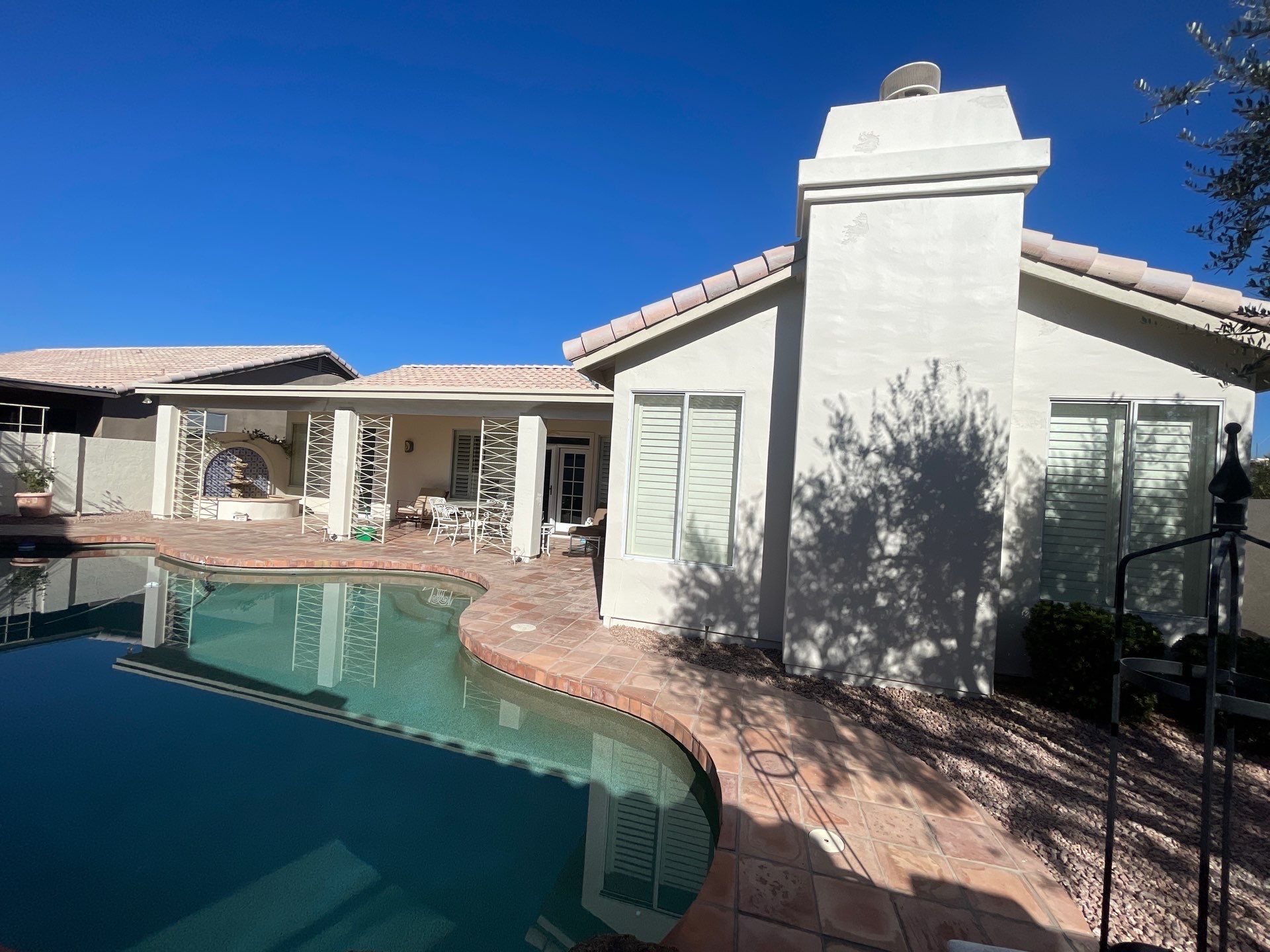 Gazzo - A Beautiful Home Exterior Transformation in Scottsdale, AZ with C&M Primer and Sherwin Williams Paints by Double G Painting Contractors, LLC