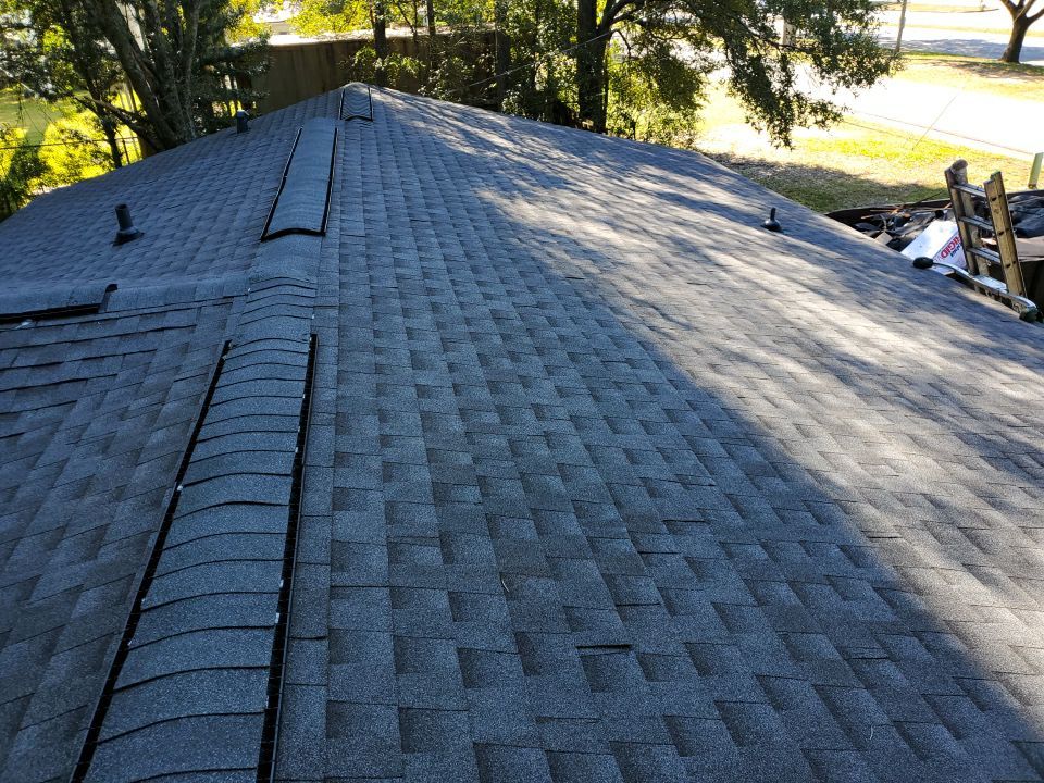 Residential Roofing Installation using Roof Replacement by American Roofing & Construction LLC