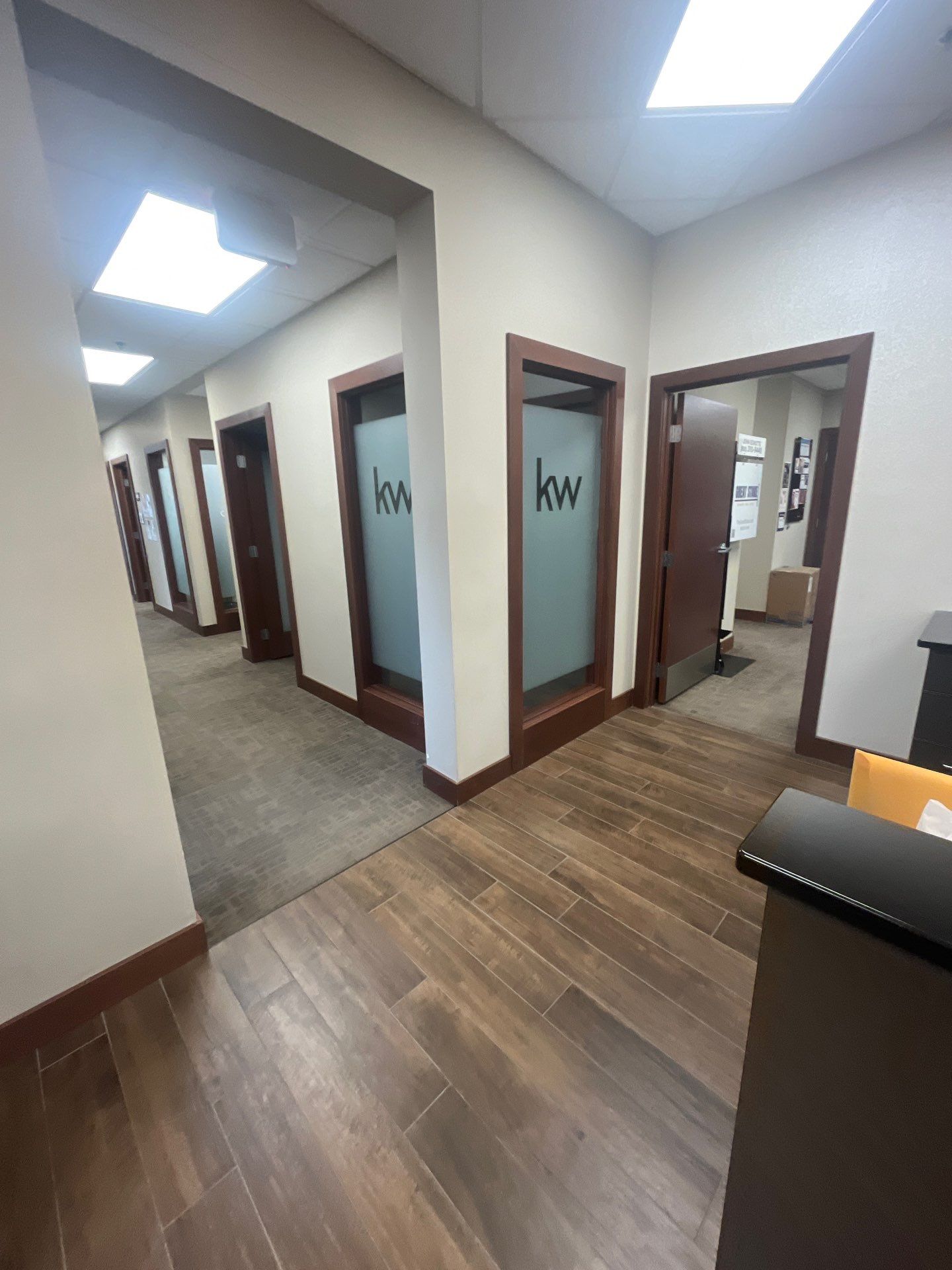 Commercial Office Interior Remodel and Modern Suite Refresh in Sioux Falls by Select Painting, Coatings & Garage Cabinets