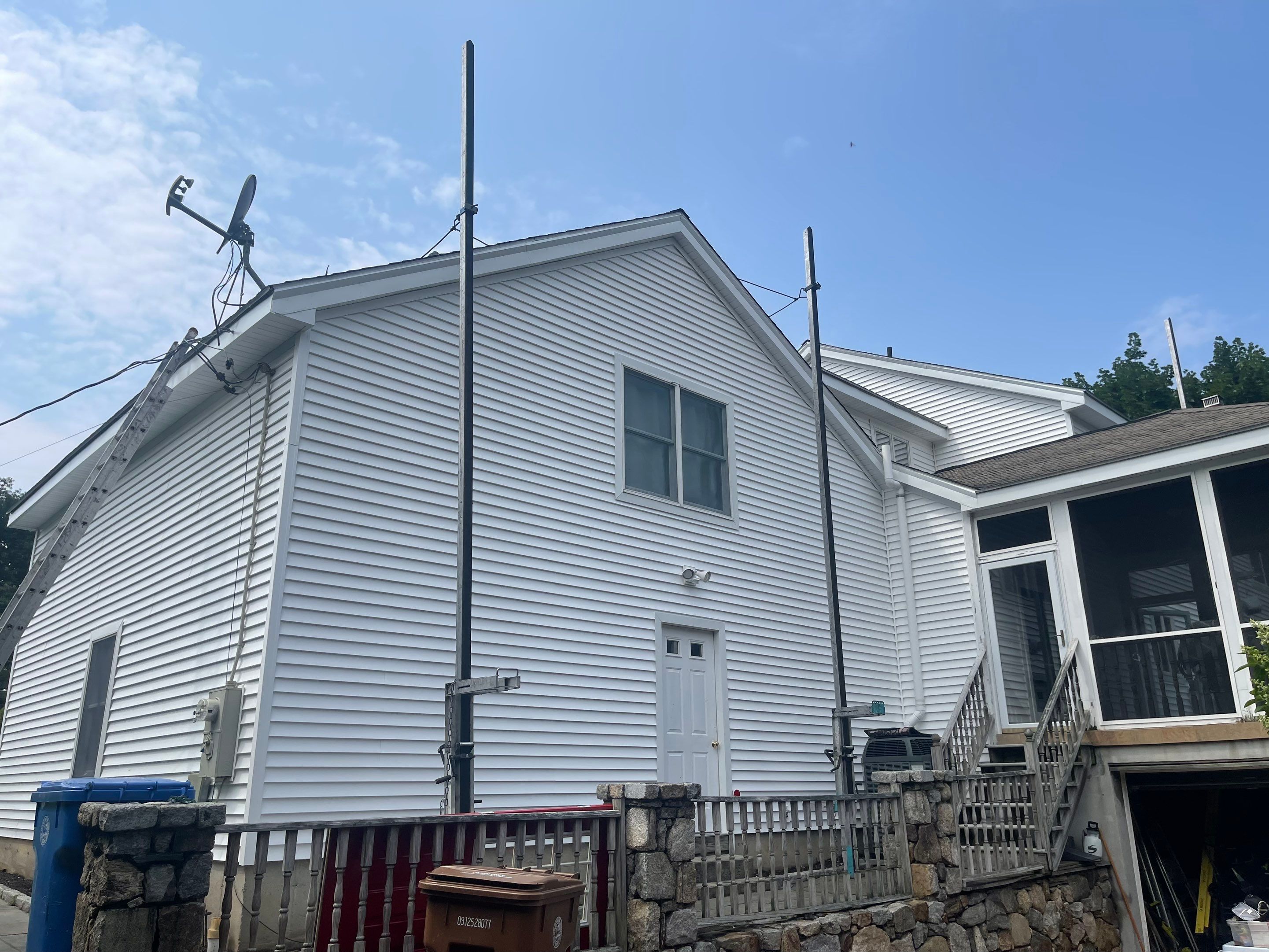 Siding Installation using Mainstreet Colonial & White gutters by A Plus Exterior