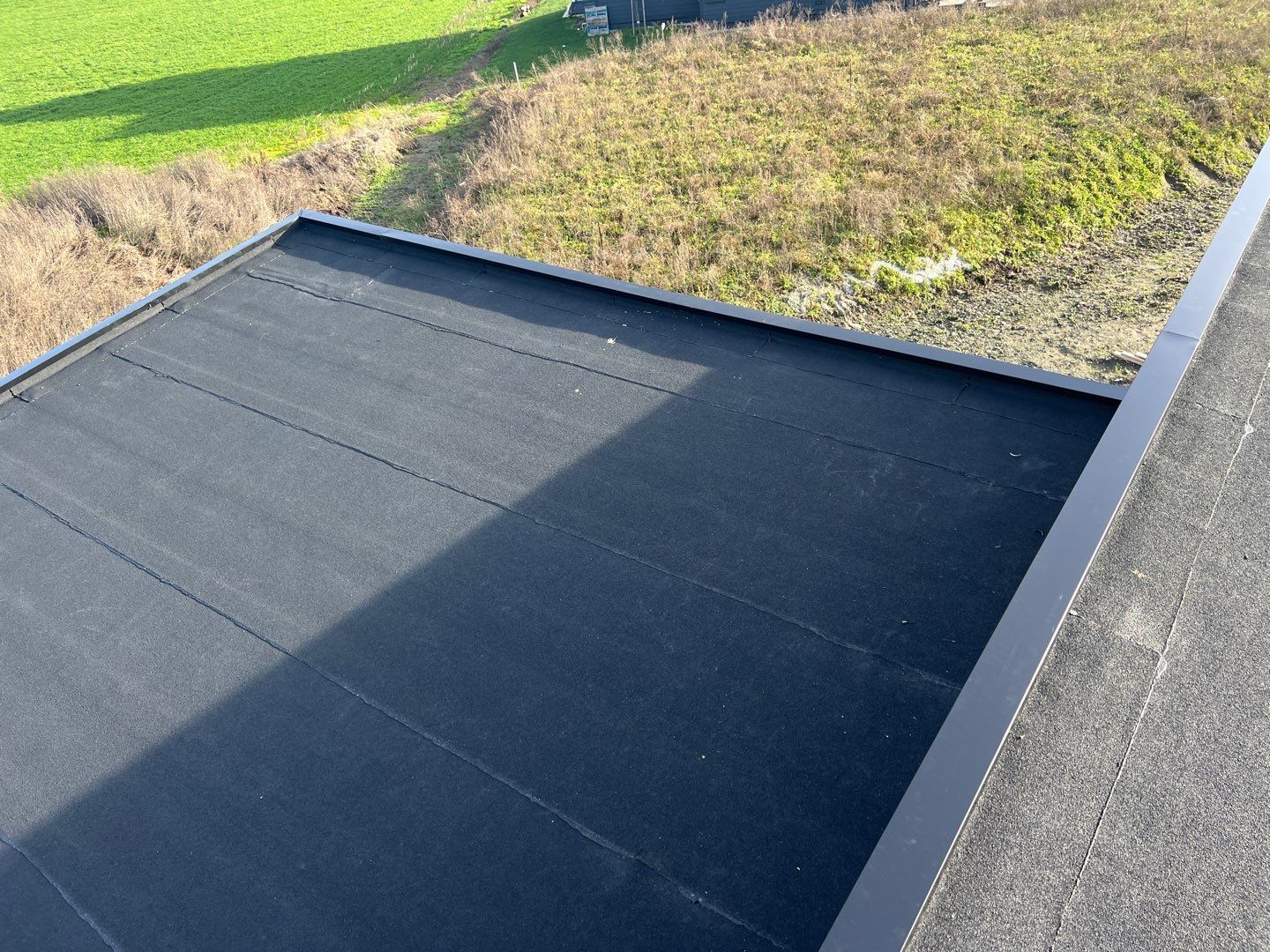 Residential Roofing Installation by Top Notch Roofing Inc