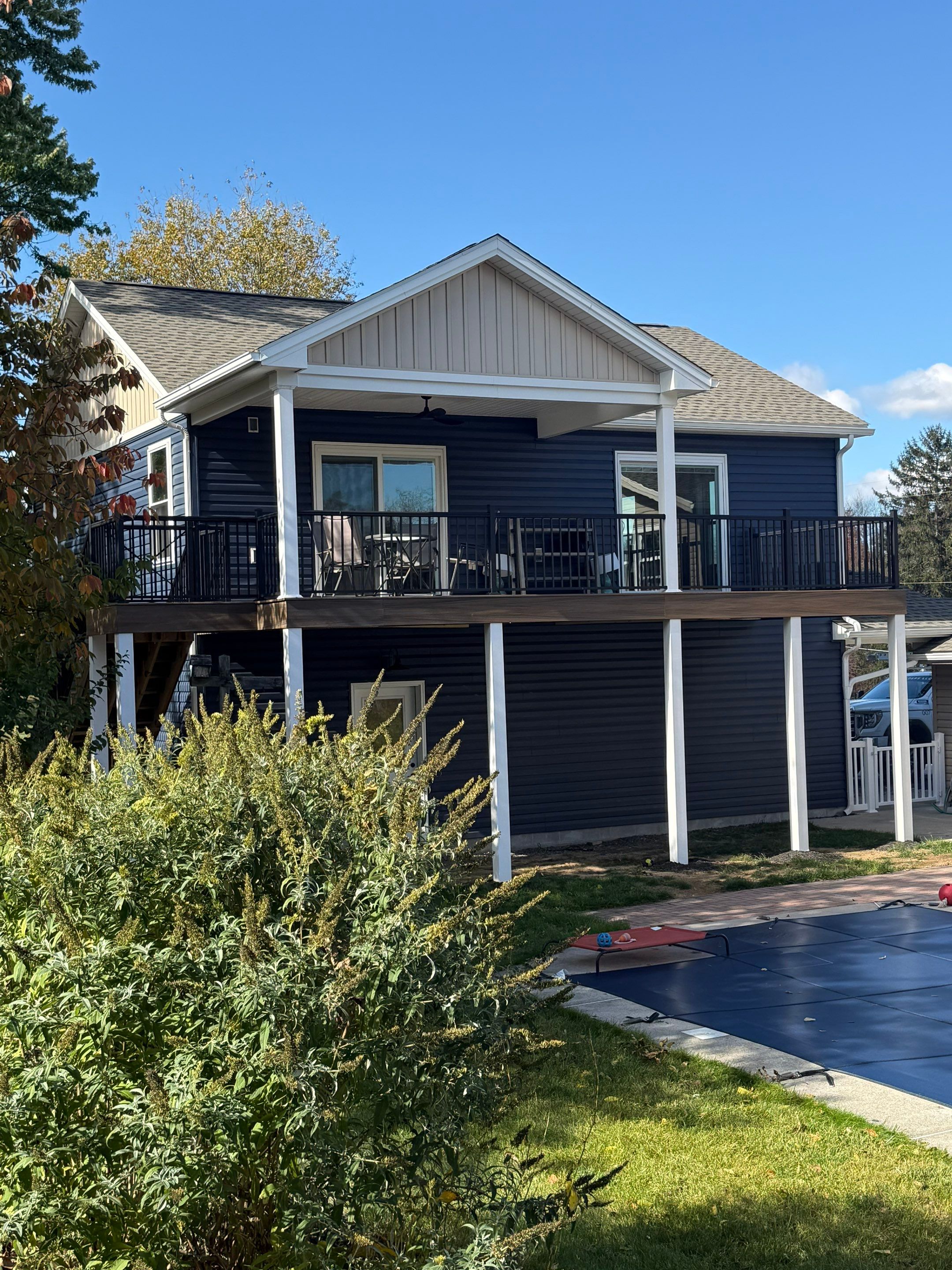 Two-Story Residential Addition and New Garage in Hummelstown by Esh Builders