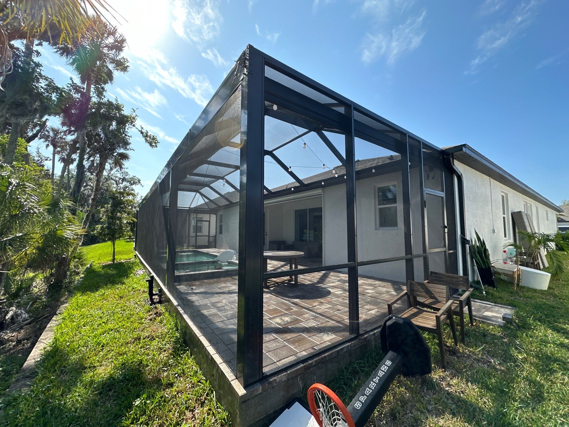 Screen Enclosure & Paver Pool Deck Cleaning in Trevesta Community, Palmetto, FL | Sunshine AquaWash by Sunshine AquaWash