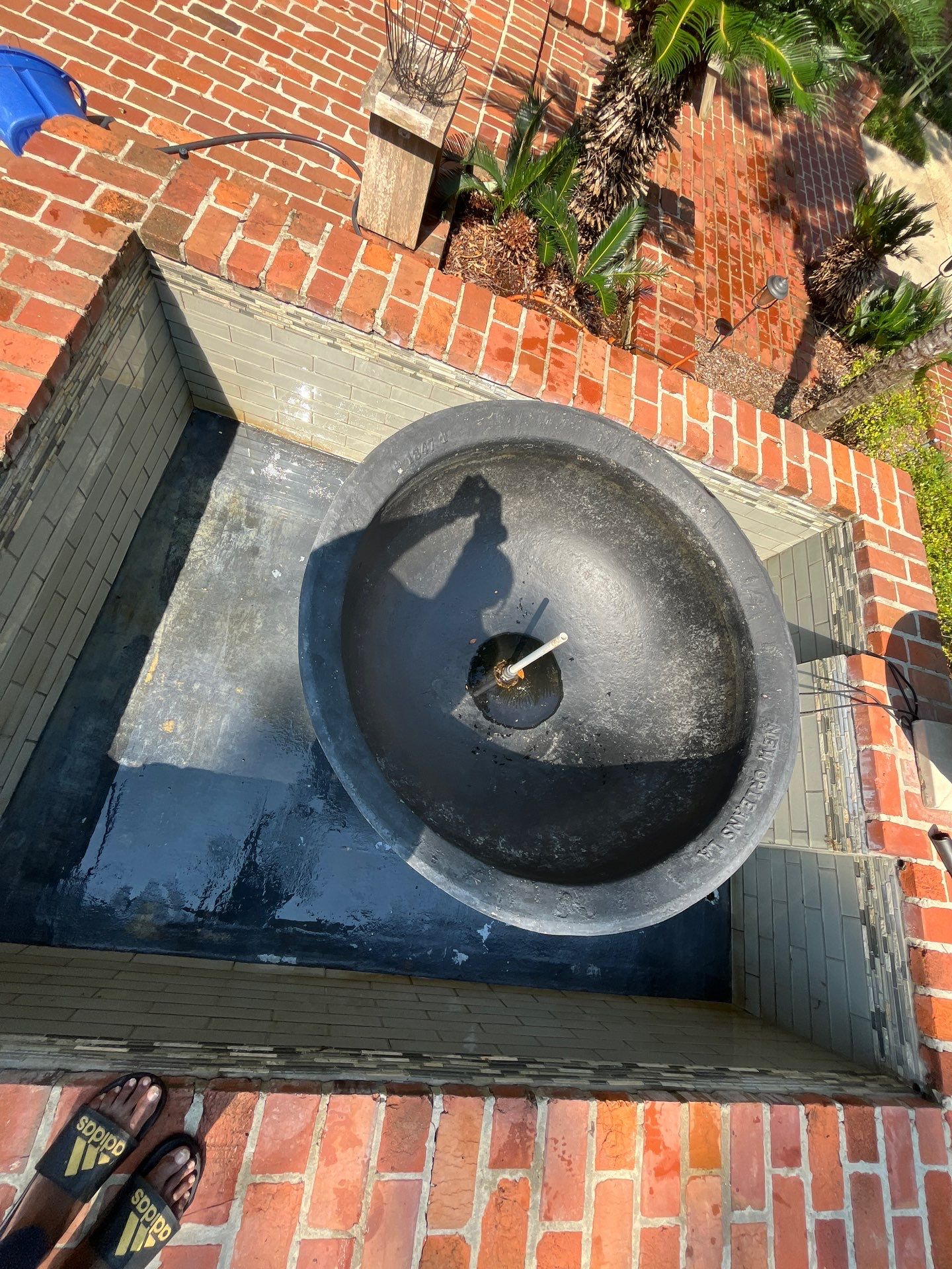 Pool Cleaning using Pool Cleaner by College Bros Outdoor services