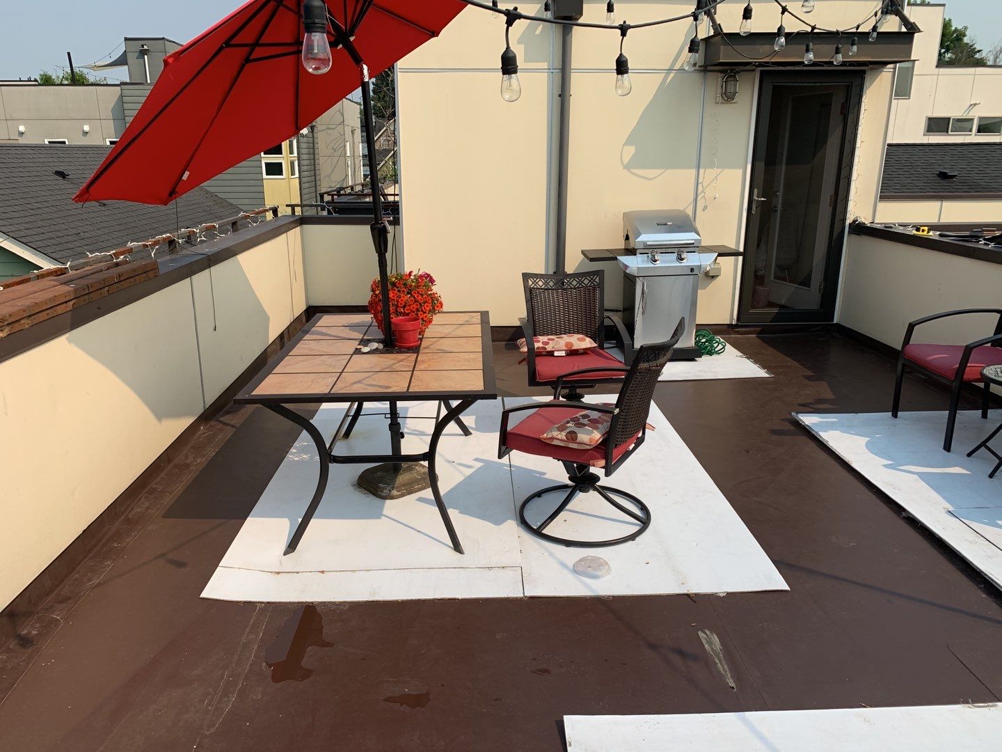 Ballard Rooftop Deck using IPE Tiles by Alki deck builders