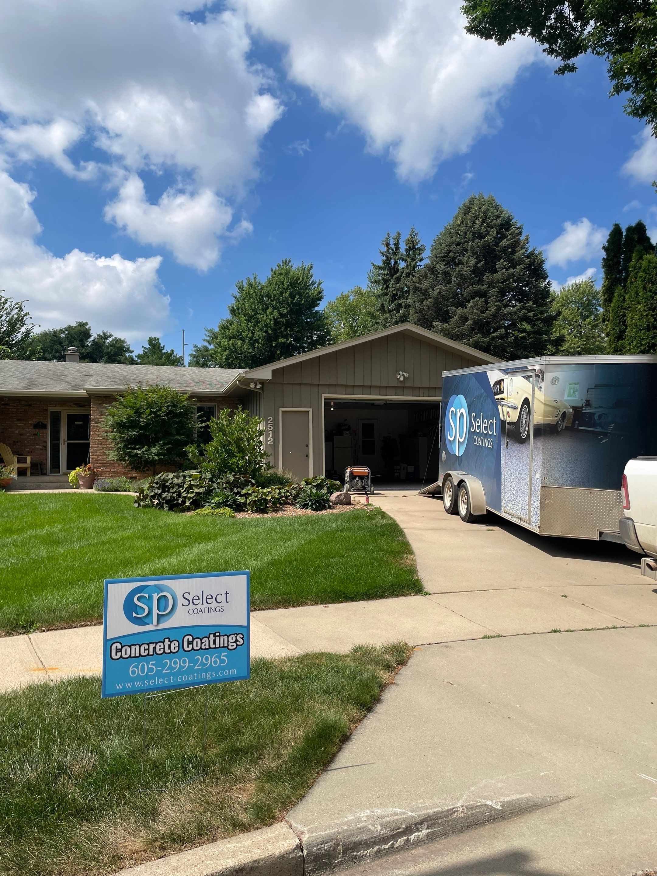 Custom Creekbed Garage Floor Coating in Sioux Falls by Select Painting, Coatings & Garage Cabinets