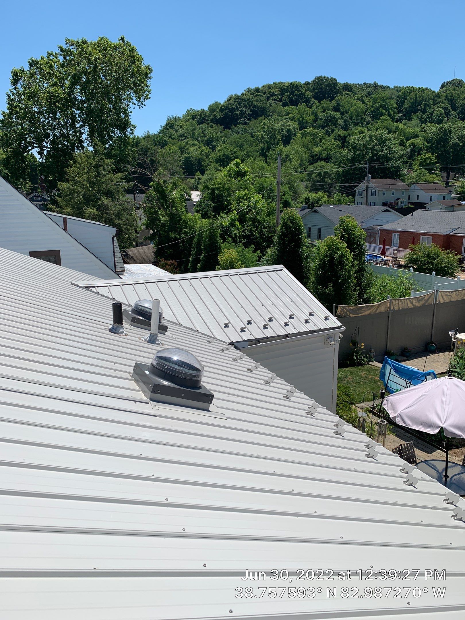 Metal Roofing, Skylights, Porch Build by Secure Construction Company Inc