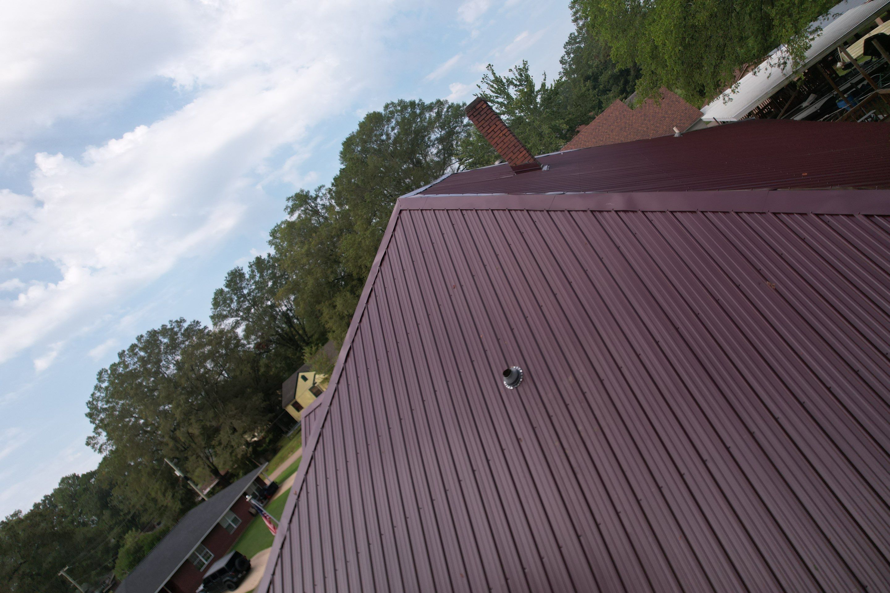Residential Metal Roof Replacement using Reed's Metals: Colored Residental Panel (Burgundy) by Hostetler Roofing