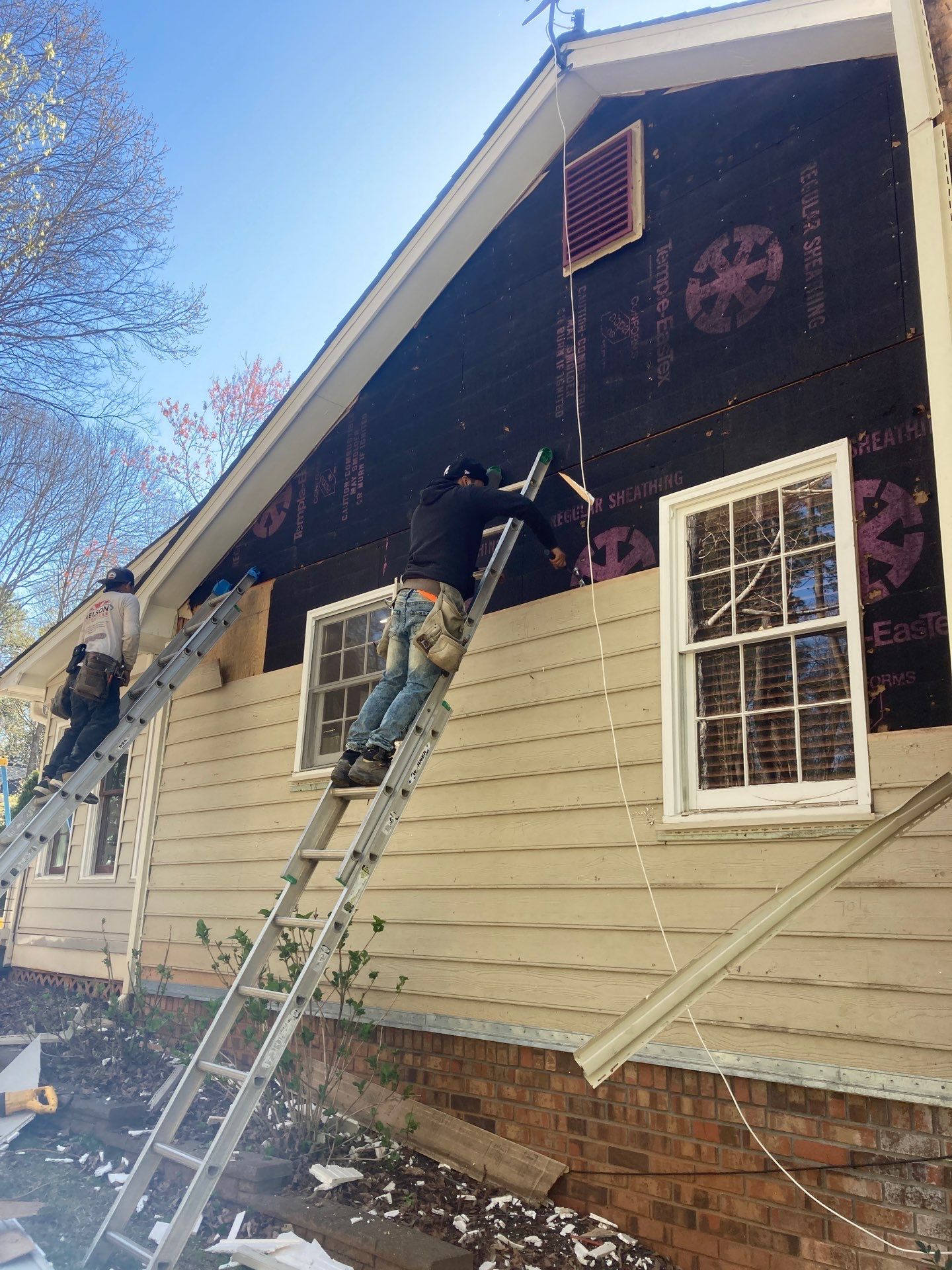 Window, Siding, & Rotten Wood Replacement with Exterior Painting in Woodstock, GA by Nelson Exteriors 