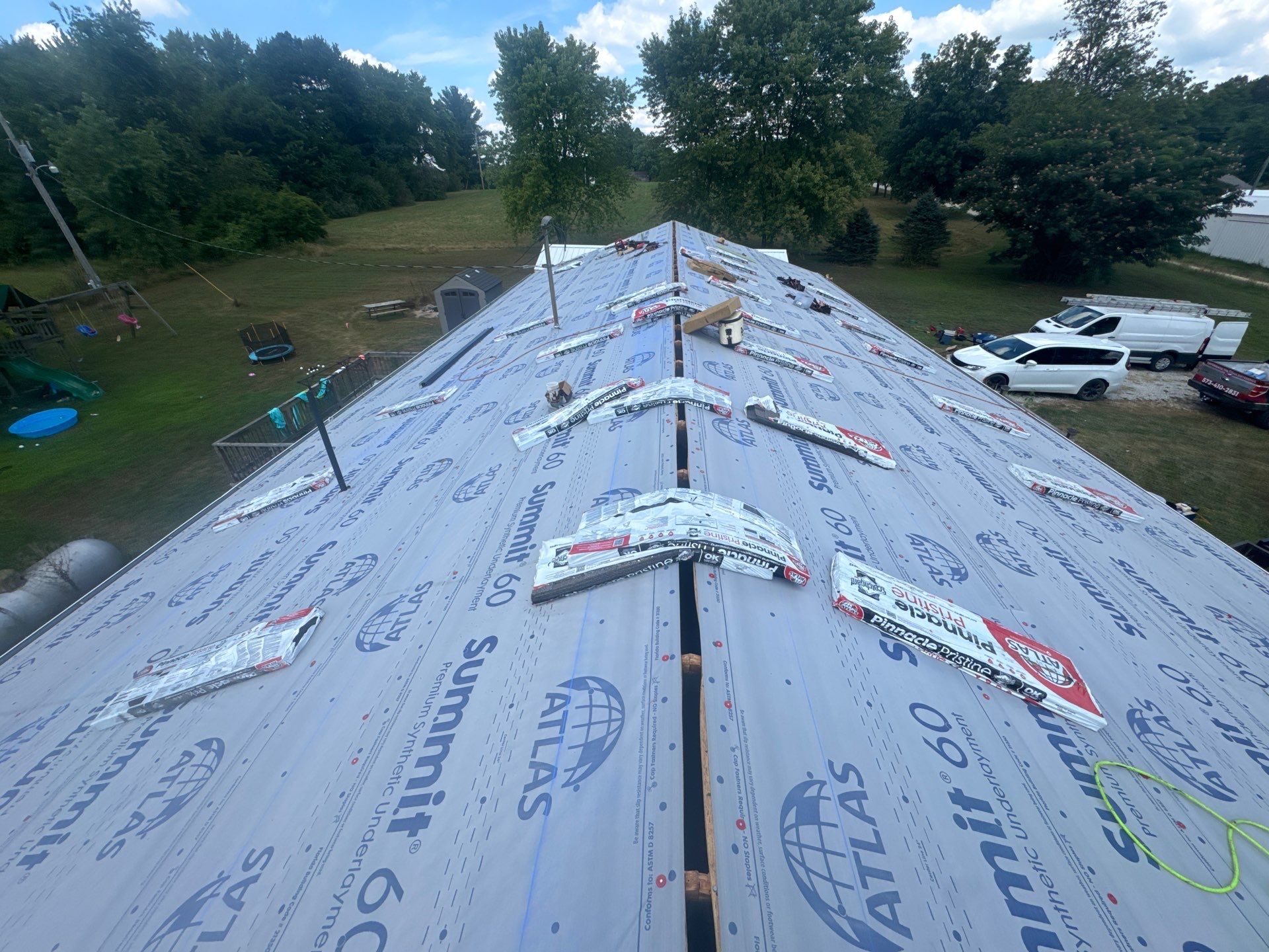 Residential Roofing & Downspouts Install  by Titan Commercial & Residential Roofing 