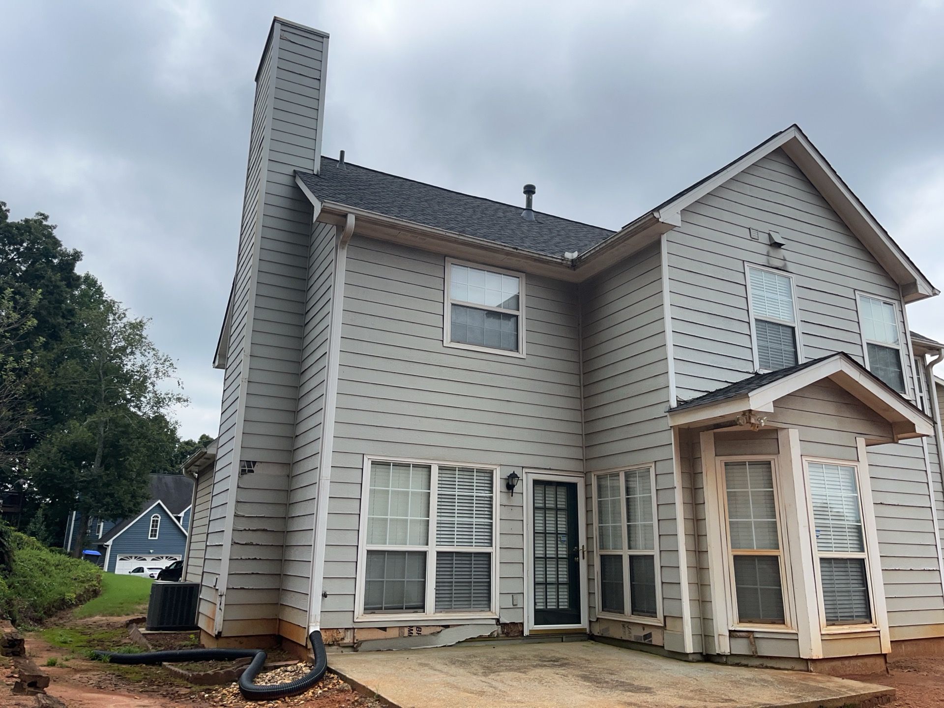 Lawrenceville, GA Full Siding Replacement, Exterior Painting, and Window Installation by Nelson Exteriors 