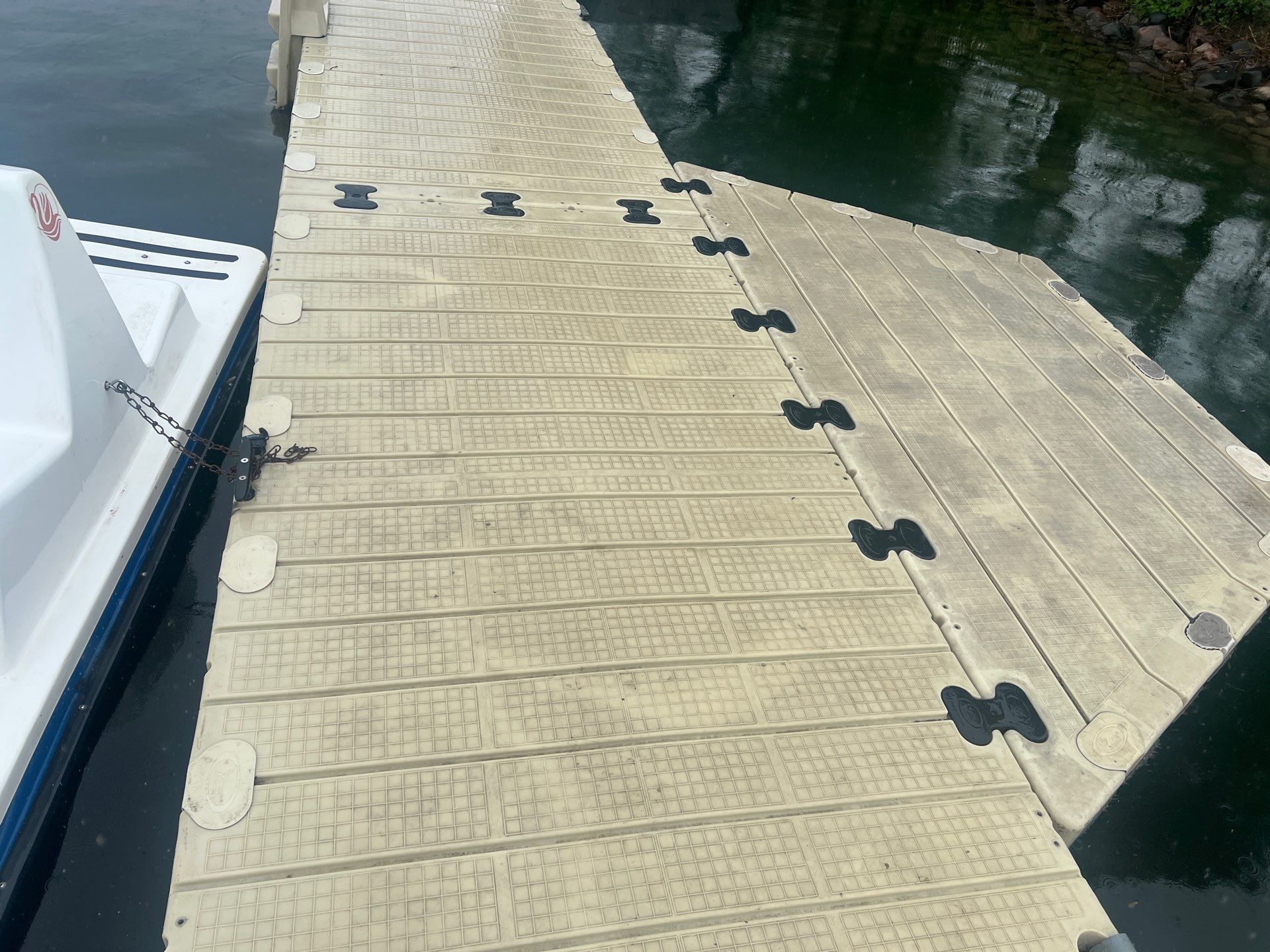 Power washing of floating dock by Northern Power Washing LLC.
