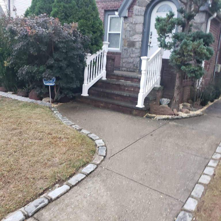 New Roof & Gutters by Island Roofing Inc.