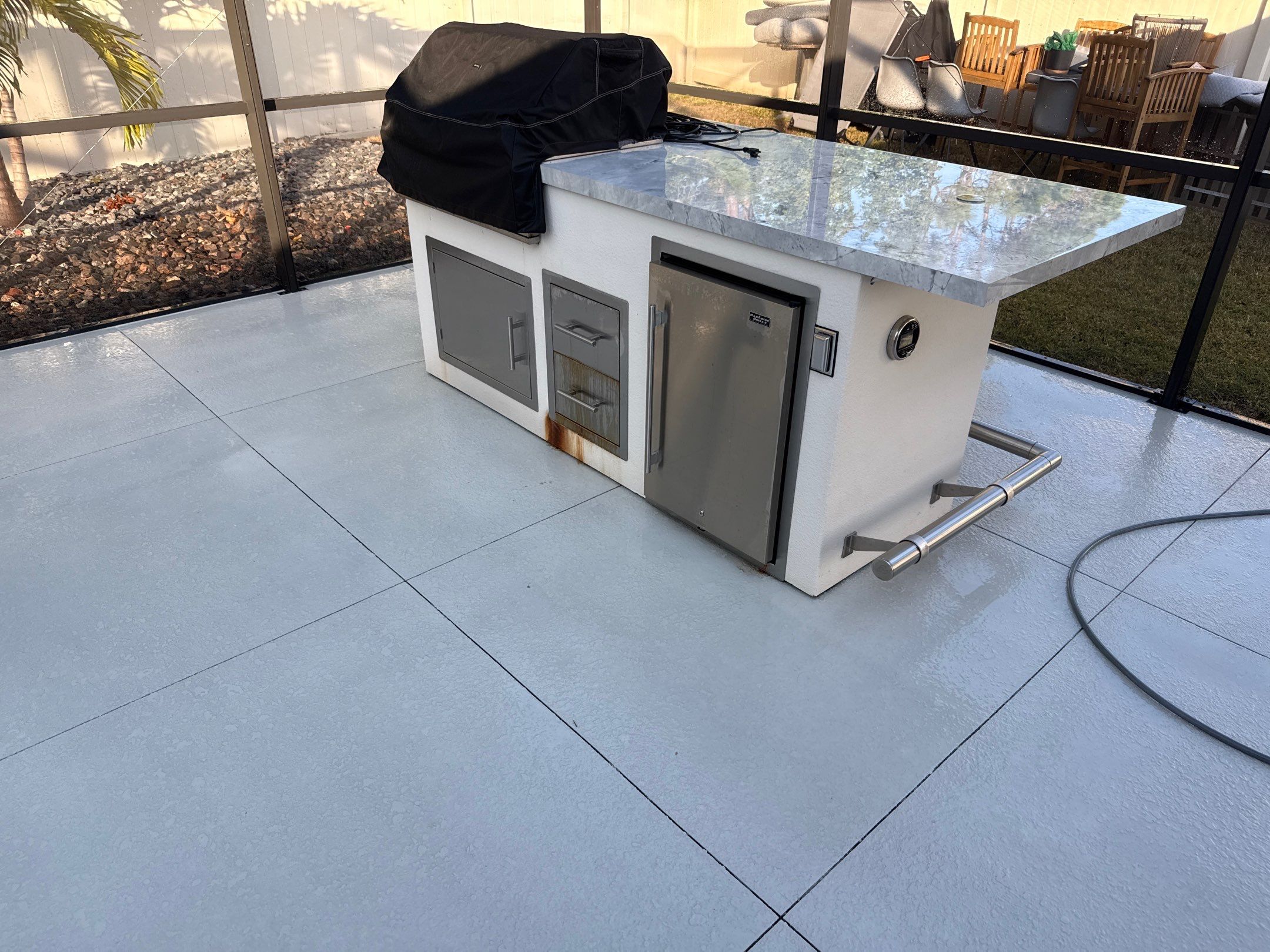 Painted Pool Deck & Screen Enclosure Cleaning | Heron Creek, Palmetto FL by Sunshine AquaWash