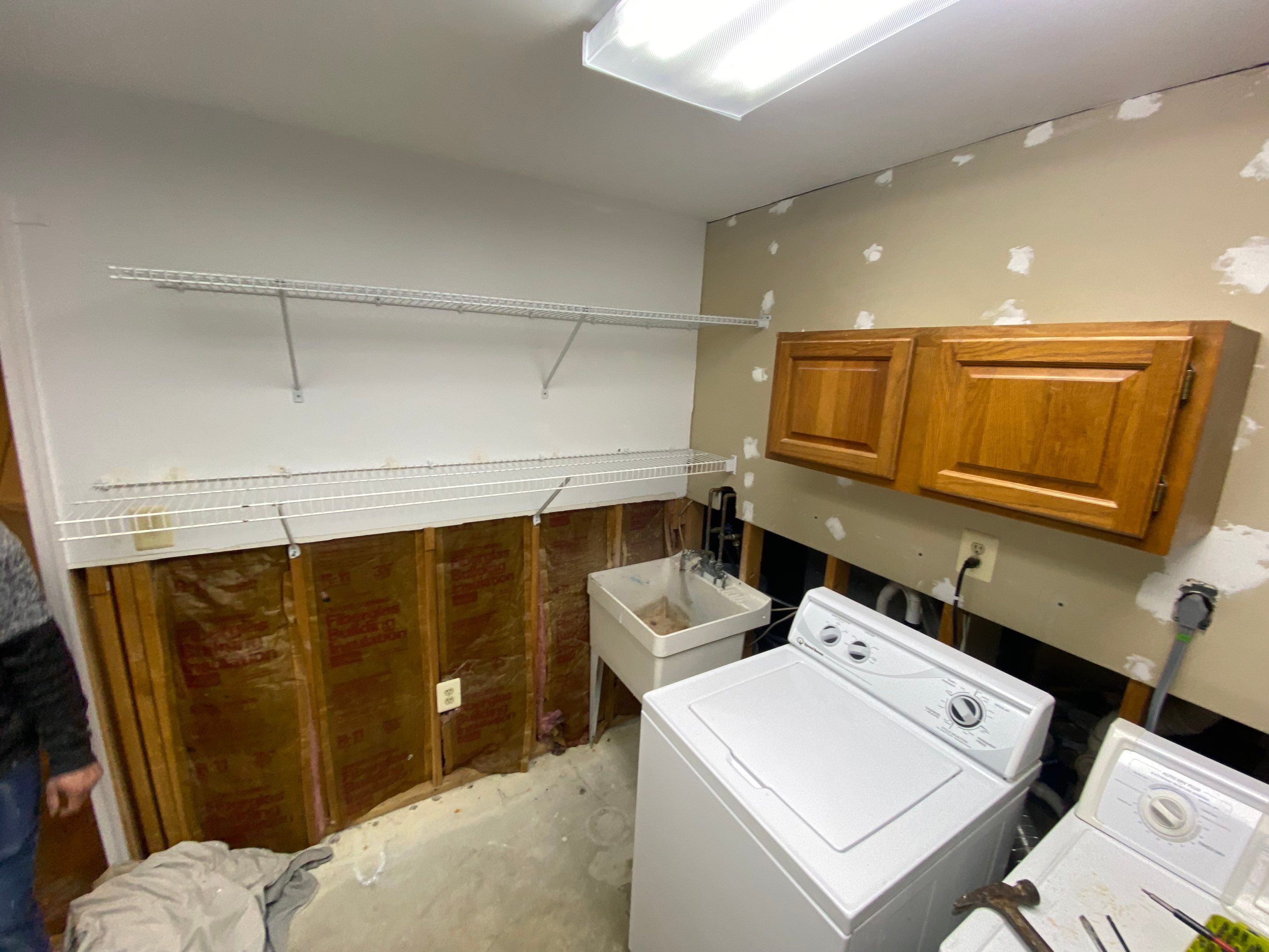 Laundry Room Redmodel using Lifeproof Luxury Vinyl Plank Flooring by The Smet Companies, LLC