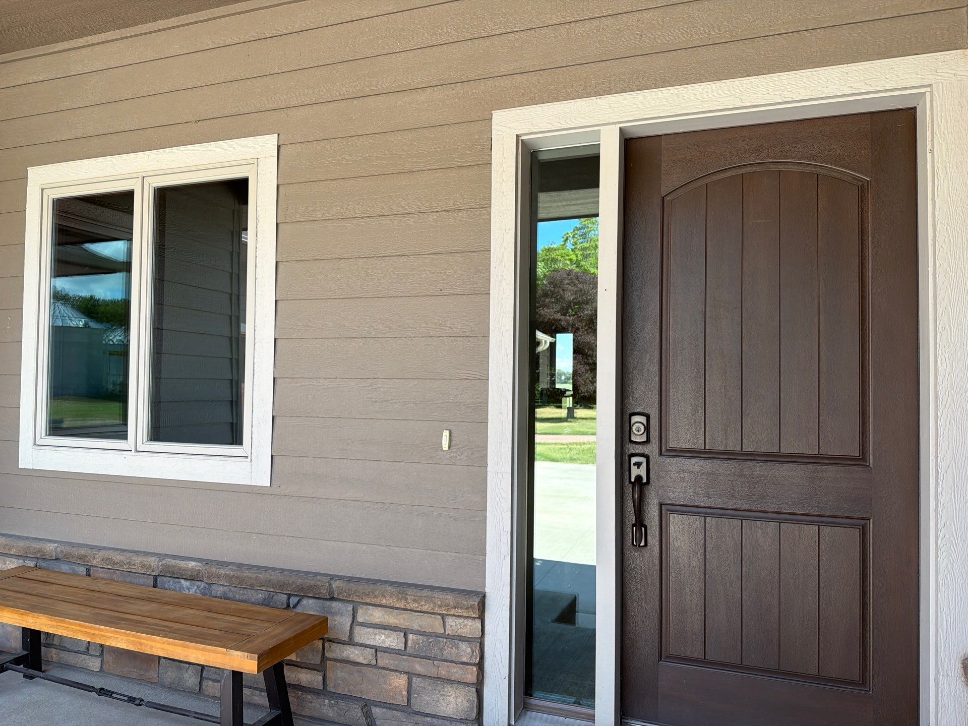 Full Exterior Siding Paint Restoration and Refresh in Garretson by Select Painting, Coatings & Garage Cabinets