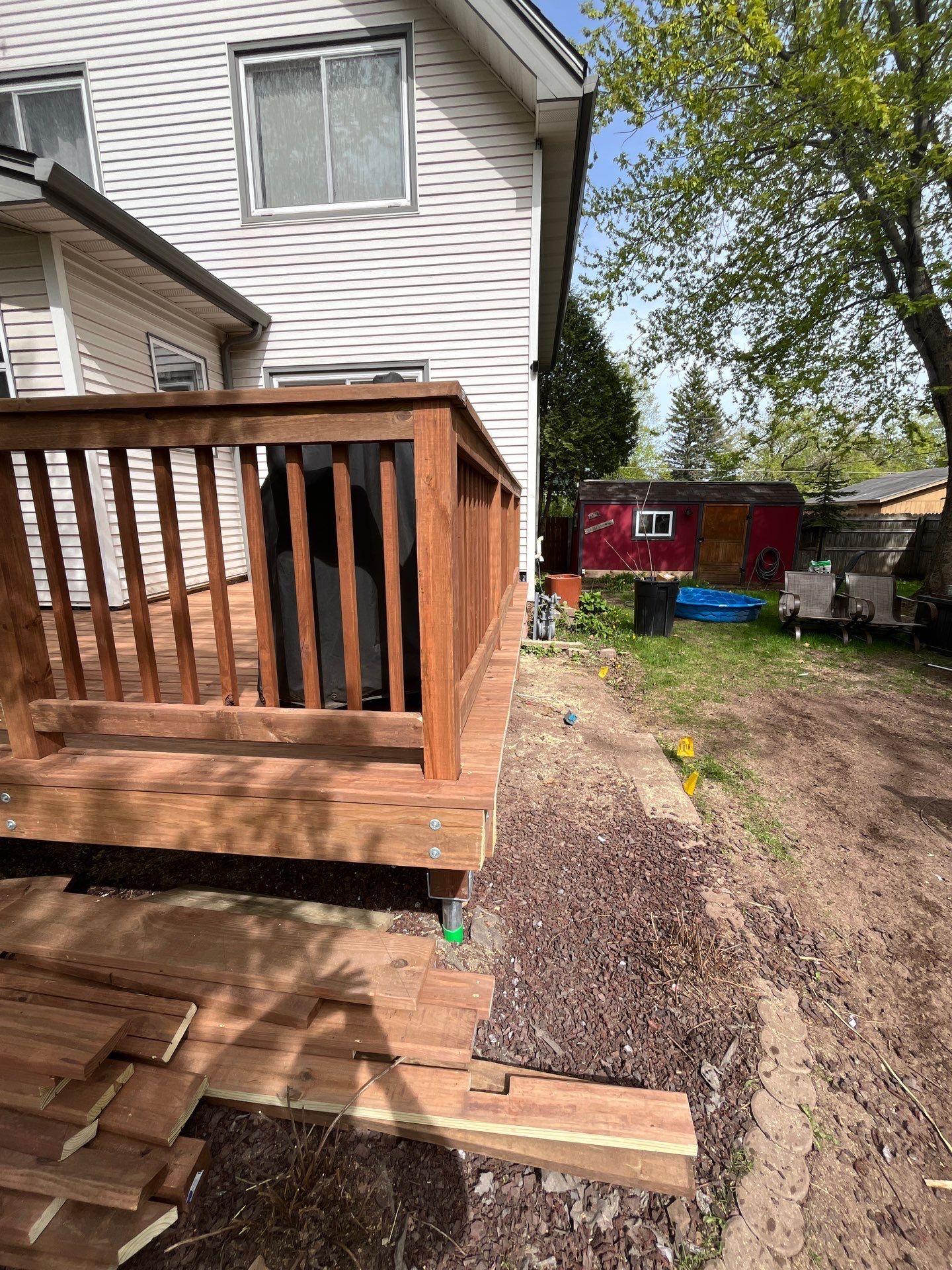Brown Treated Deck by Anchor North Property Services