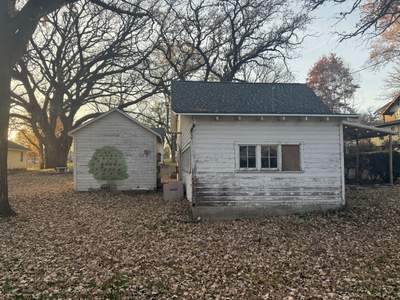 Garage Roof Replacement and Gutter Guard Installation in Red Oak