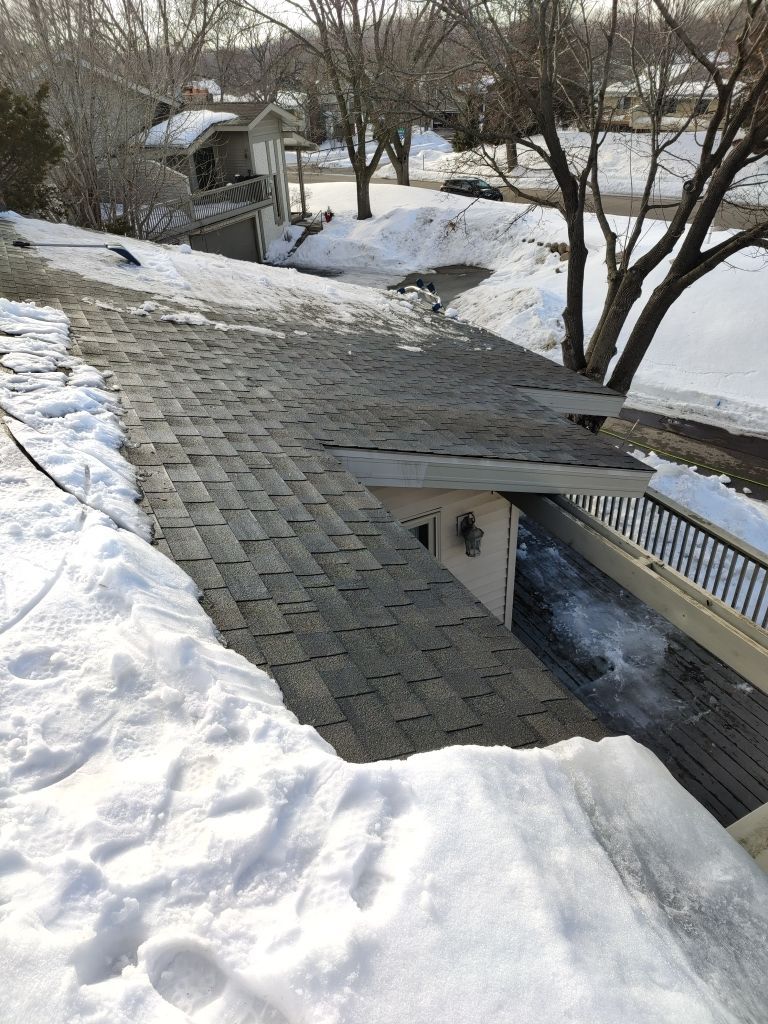 Ice Dam Removal in Eden Prairie by Next Level Seamless Gutters / Exteriors Inc.