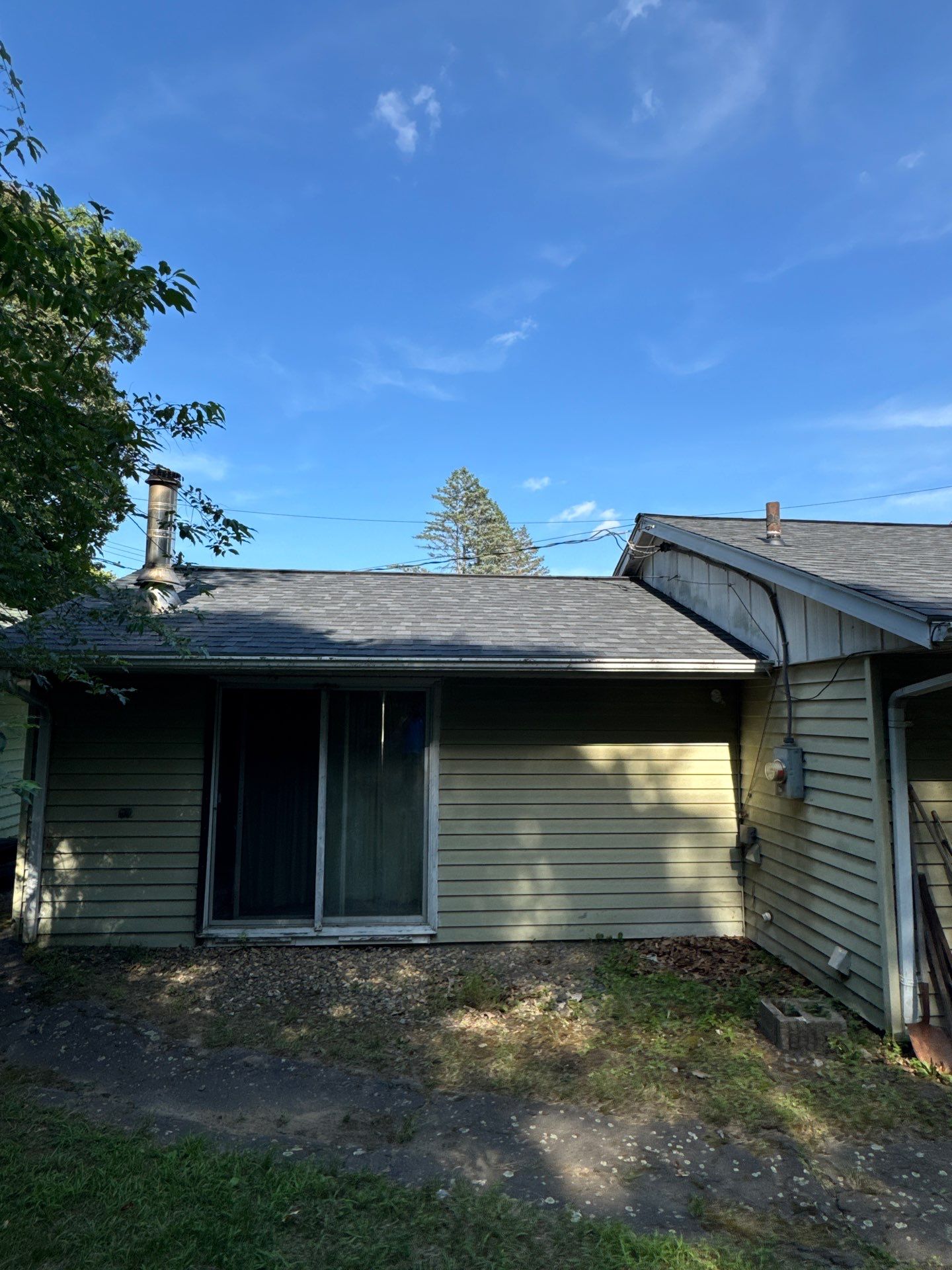 Onyx Black Roof Transformation in Maynard, MA by Mighty Dog Roofing of Greater Middlesex County
