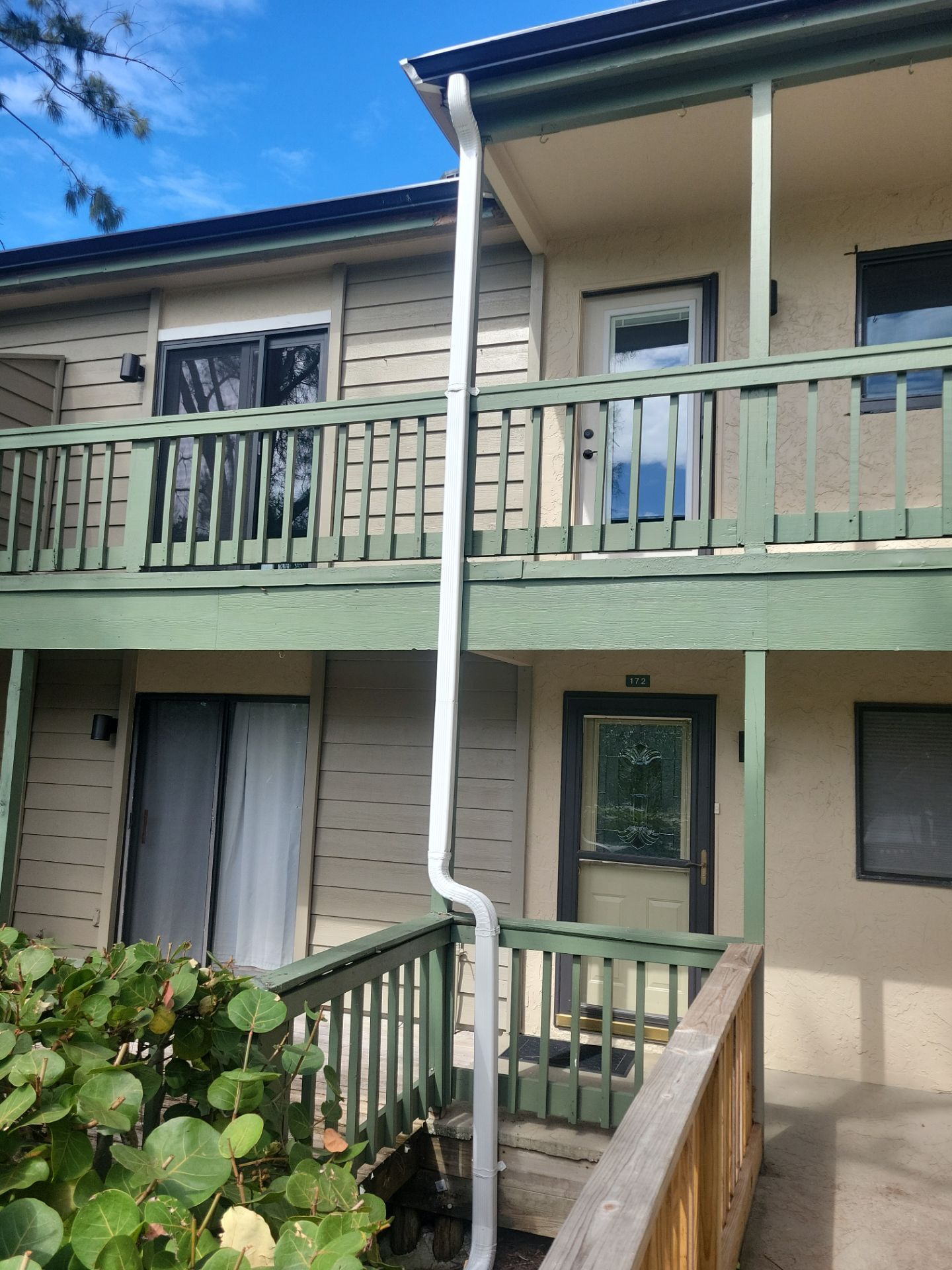 White Gutters Repair and Installation in Sarasota FL by Gutter Professors